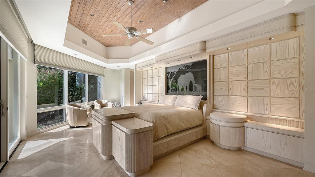 510 Harbor Gate Way Longboat Key, FL 34228 - Photo 21 of 98 a bed room with a bed and a large window