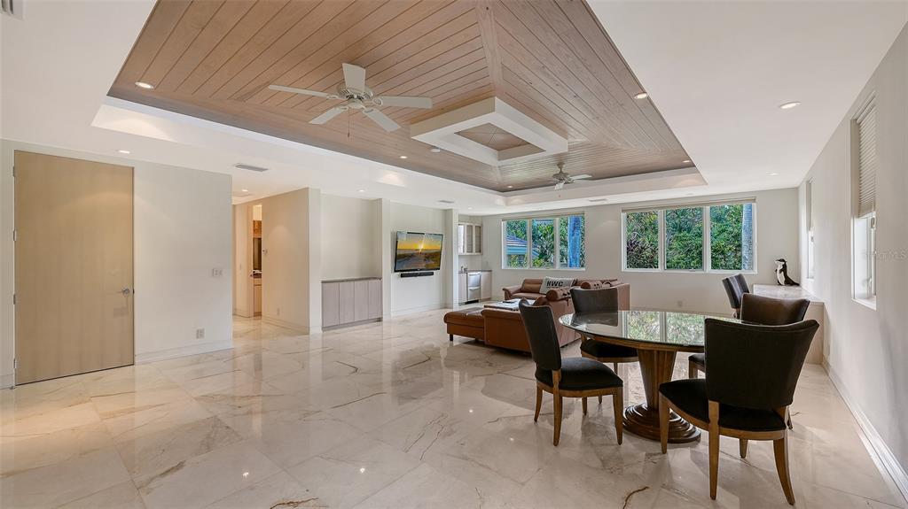 510 Harbor Gate Way Longboat Key, FL 34228 - Photo 49 of 98 a view of a dining room with furniture window and outside view