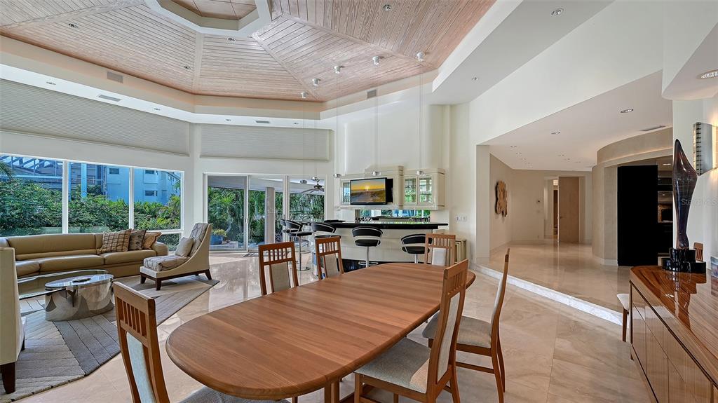 510 Harbor Gate Way Longboat Key, FL 34228 - Photo 7 of 98 a view of a dining room with furniture window and outside view