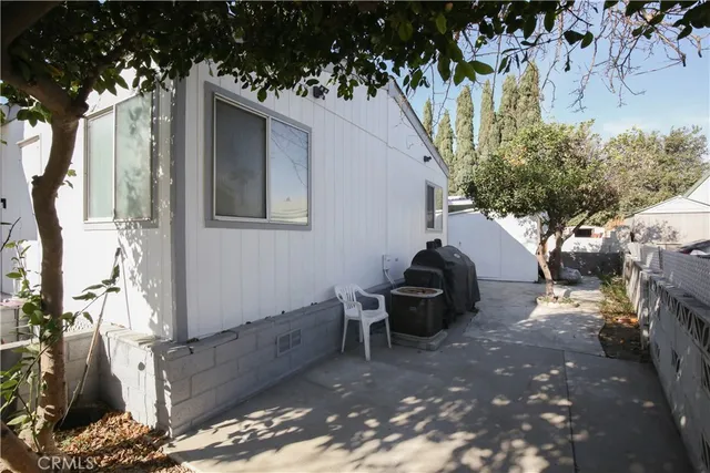 a front view of a house with patio