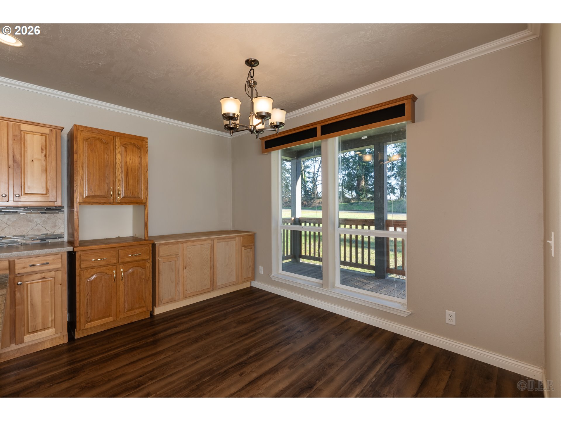 73821 Lindberg Road Rainier, OR 97048 - Photo 11 of 18 a view of an empty room with wooden floor and fan