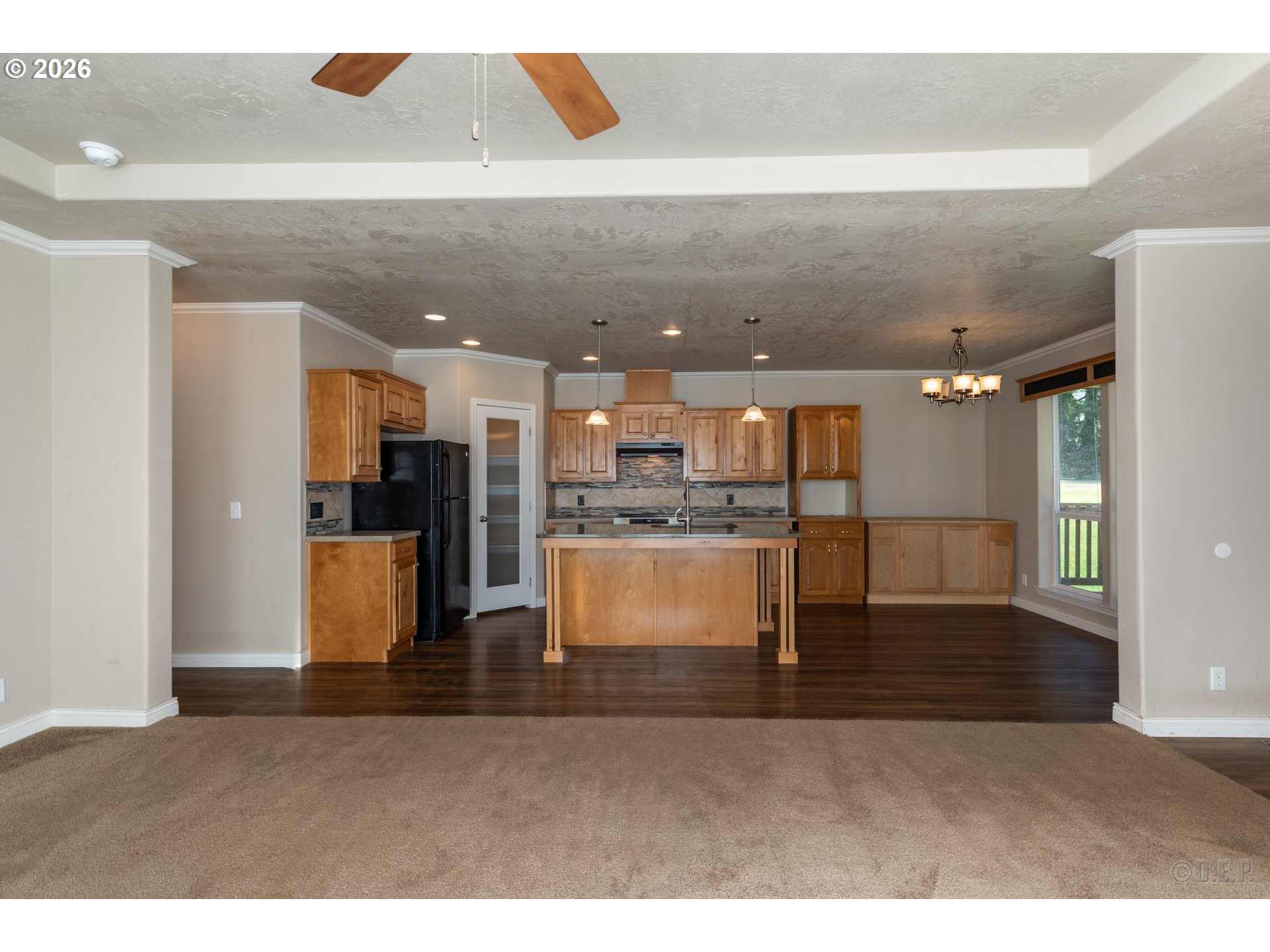 73821 Lindberg Road Rainier, OR 97048 - Photo 6 of 18 a view of kitchen with refrigerator and cabinets