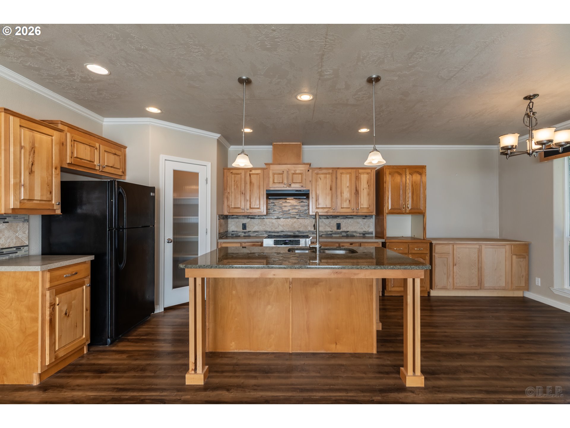 73821 Lindberg Road Rainier, OR 97048 - Photo 7 of 18 a kitchen with stainless steel appliances granite countertop a refrigerator a stove top oven and a sink