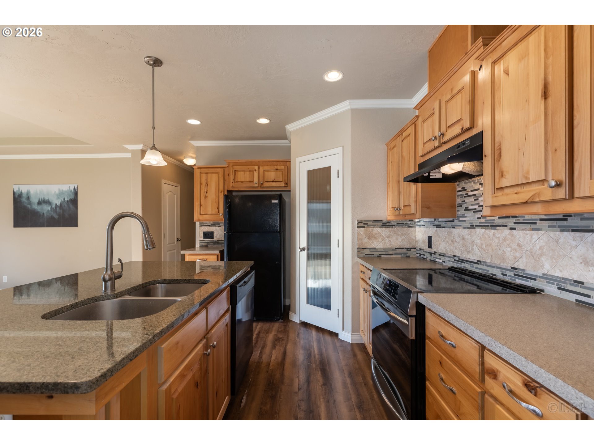 73821 Lindberg Road Rainier, OR 97048 - Photo 10 of 18 a kitchen with stainless steel appliances granite countertop a sink stove and refrigerator