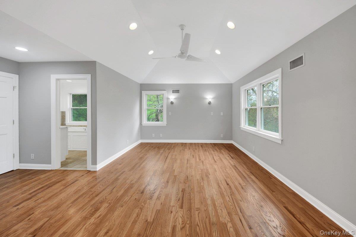 7 Rutledge Road Valhalla, NY 10595 - Photo 26 of 37 Spacious room featuring wood-finish flooring, a vaulted ceiling, and recessed lighting