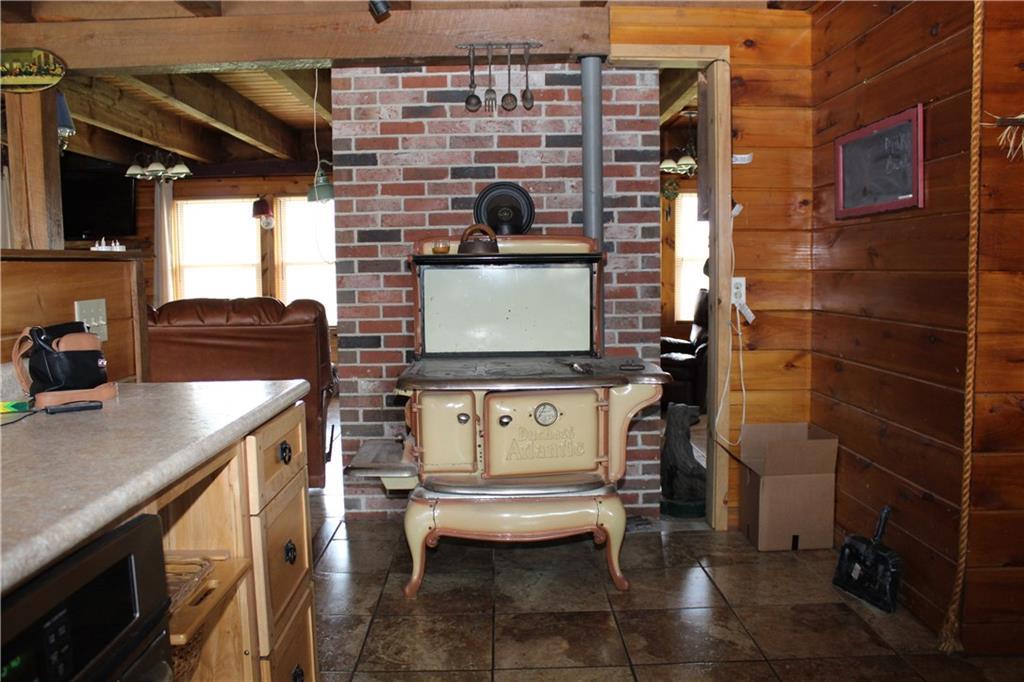 114 Donigan Road Moscow, ME 04920 - Photo 12 of 27 Atlantic wood fired kitchen stove...