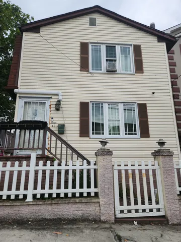a front view of a house with windows