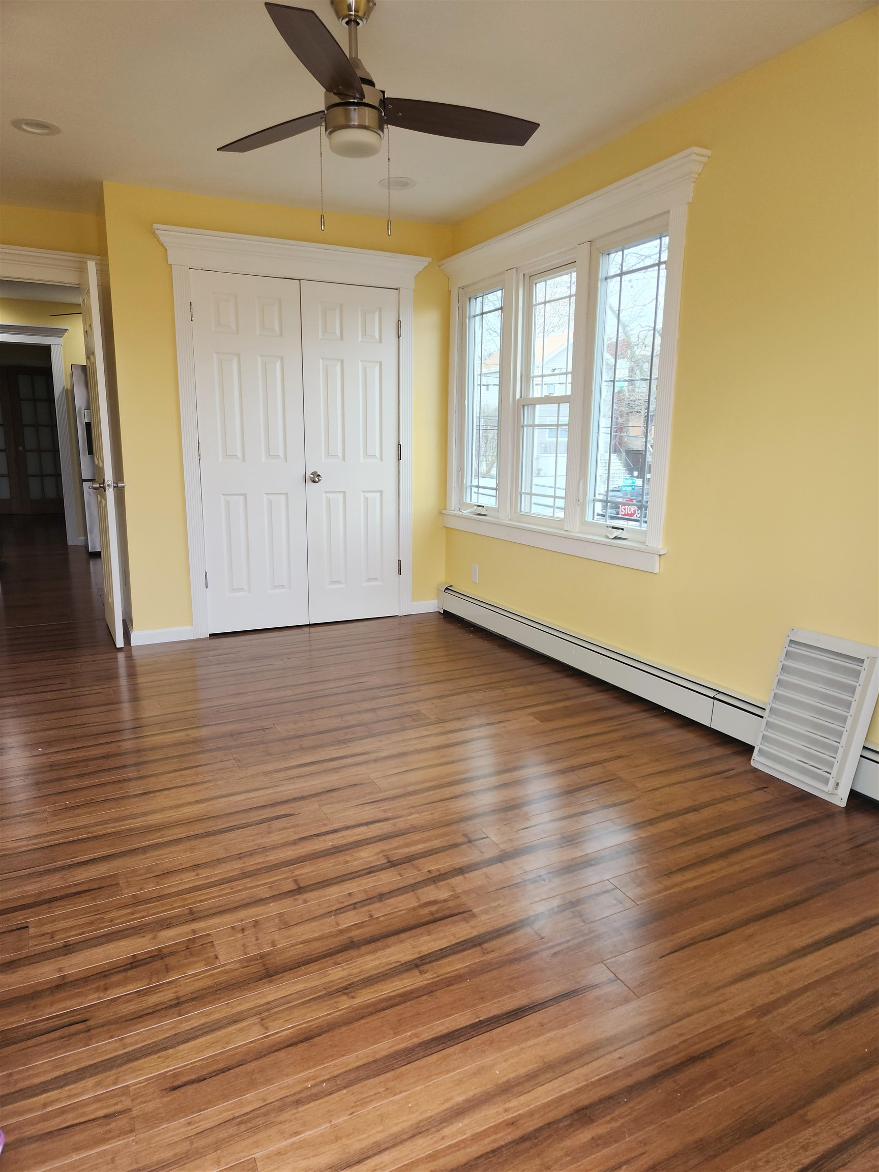 39 Terhune Avenue, Unit 2 Jersey City, NJ 07305 - Photo 3 of 10 a view of room with window and wooden floor