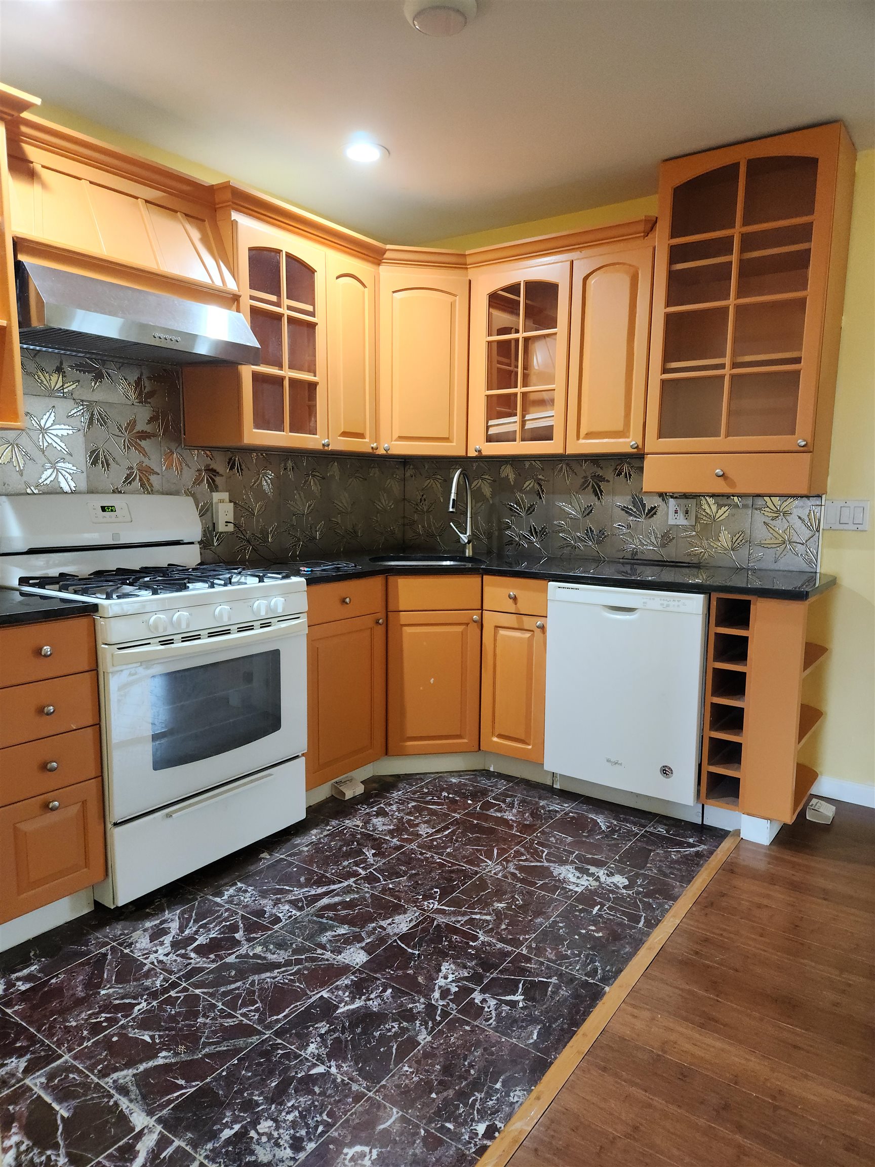 39 Terhune Avenue, Unit 2 Jersey City, NJ 07305 - Photo 4 of 10 a kitchen with a stove and cabinets