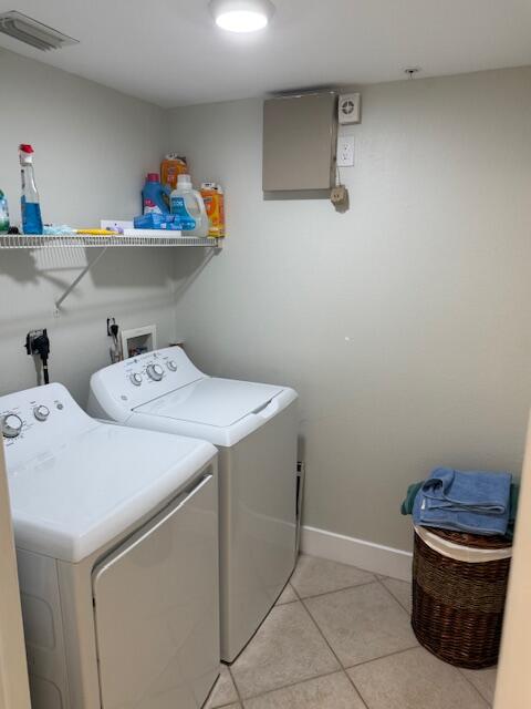 6400 Emerald Dunes Drive, Unit 301 West Palm Beach, FL 33411 - Photo 14 of 28 a utility room with dryer and washer