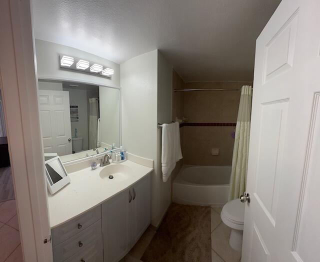 6400 Emerald Dunes Drive, Unit 301 West Palm Beach, FL 33411 - Photo 15 of 28 a bathroom with a sink a toilet and shower