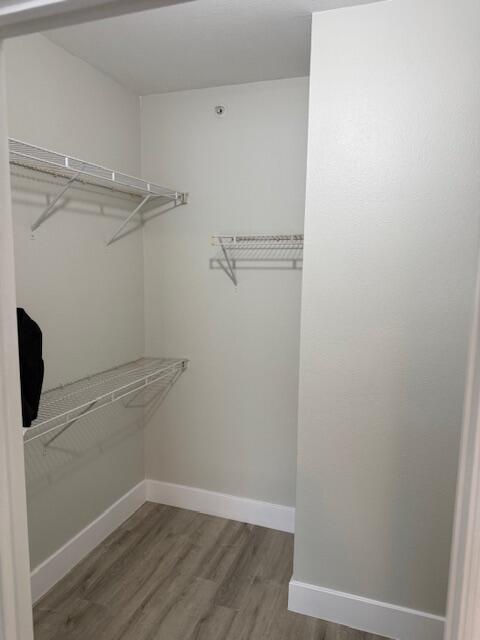 6400 Emerald Dunes Drive, Unit 301 West Palm Beach, FL 33411 - Photo 25 of 28 a view of a room with wooden floor