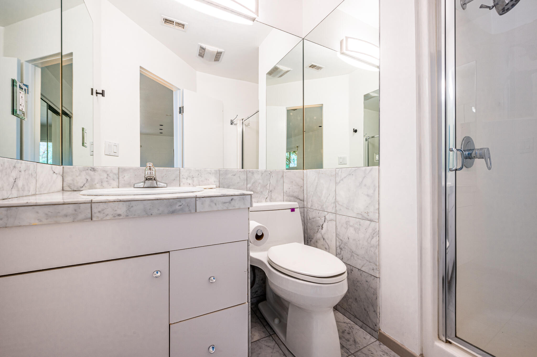 15971 Snowcreek Canyon Road Whitewater, CA 92282 - Photo 19 of 45 a bathroom with a sink toilet and shower