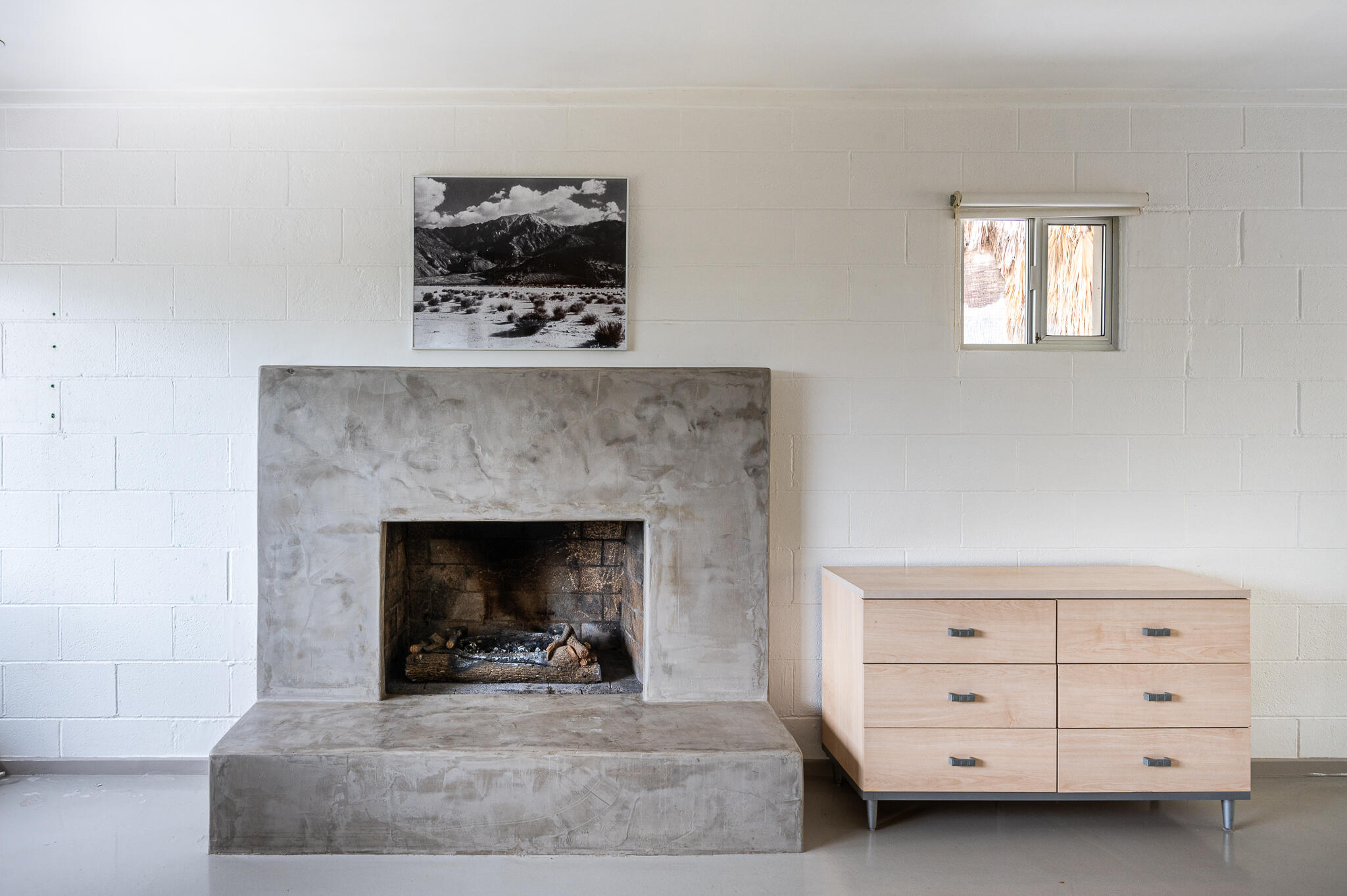 15971 Snowcreek Canyon Road Whitewater, CA 92282 - Photo 7 of 45 a living room with furniture and a fireplace