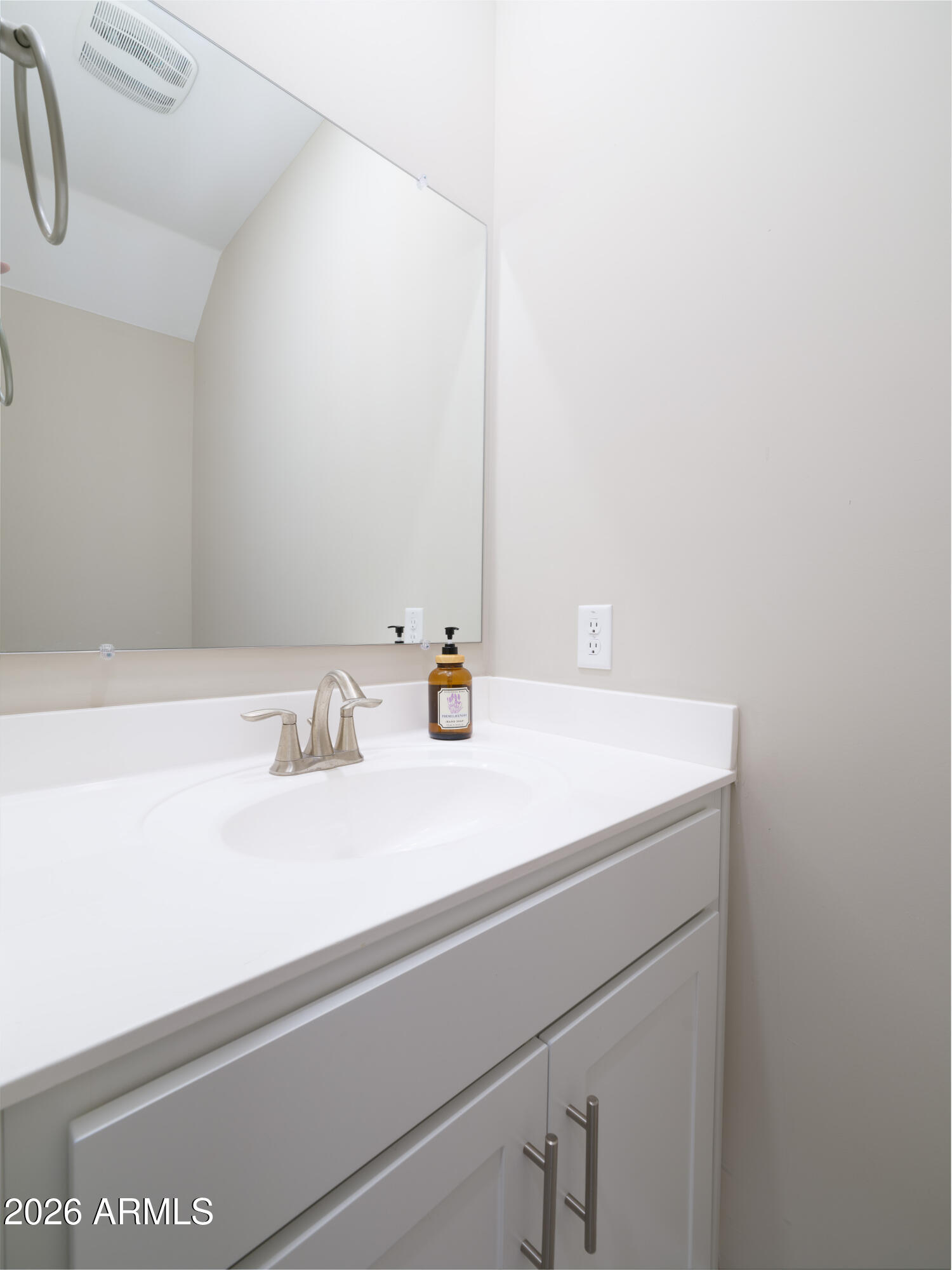 2170 West Harmont Drive Phoenix, AZ 85021 - Photo 18 of 32 a bathroom with a sink and a mirror
