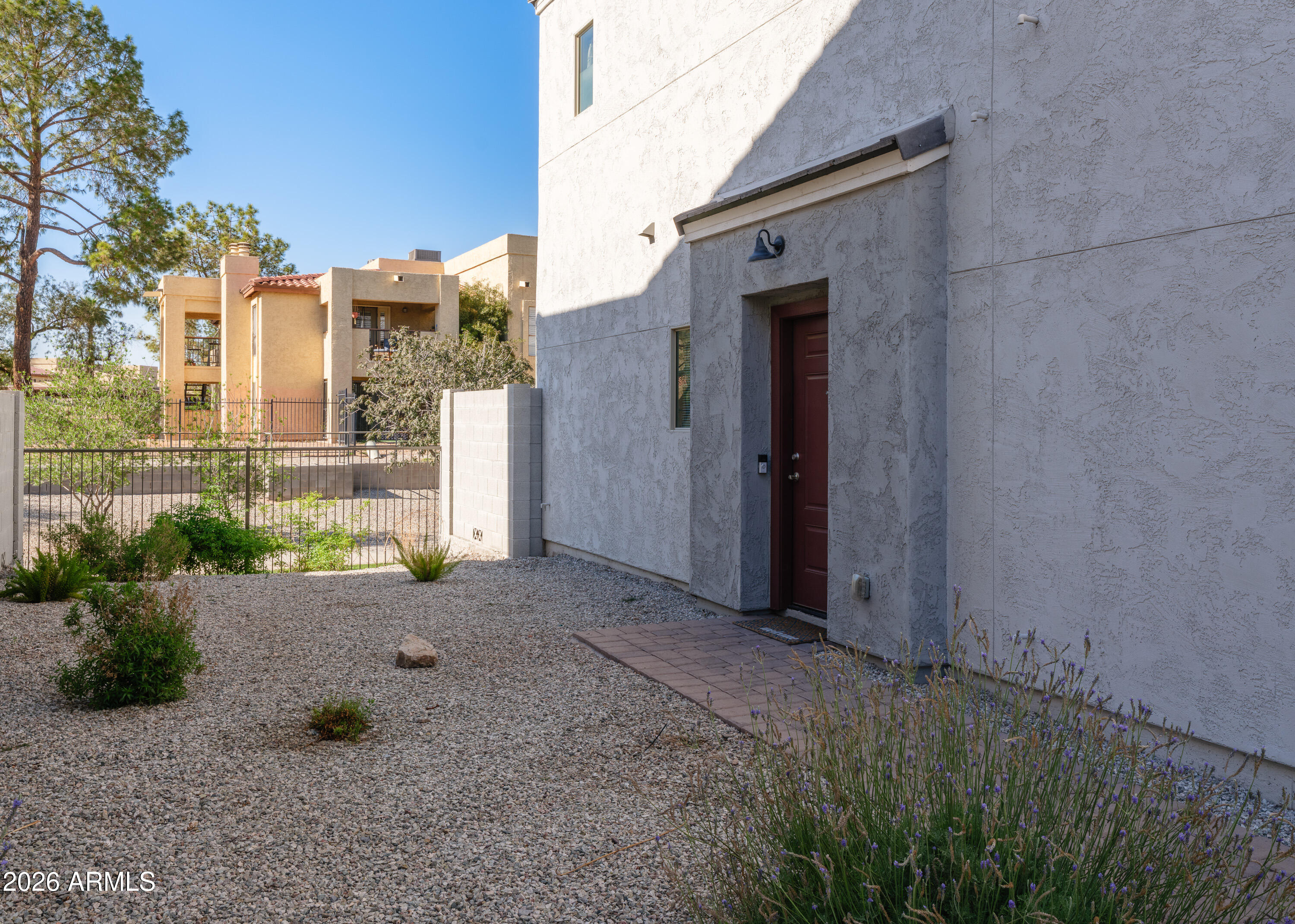 2170 West Harmont Drive Phoenix, AZ 85021 - Photo 2 of 32 a front view of a house with a yard