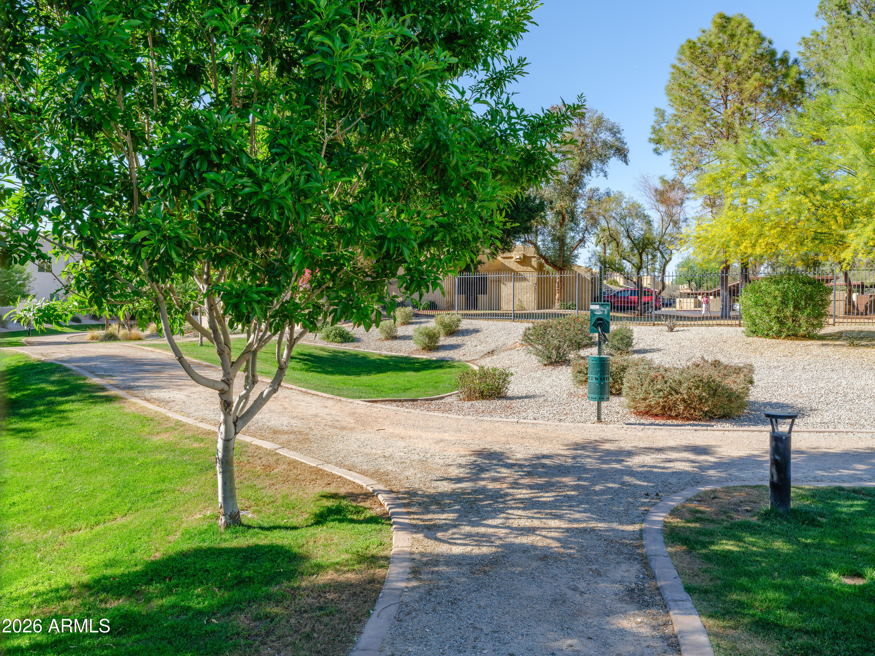 2170 West Harmont Drive Phoenix, AZ 85021 - Photo 26 of 32 a front view of a house with garden