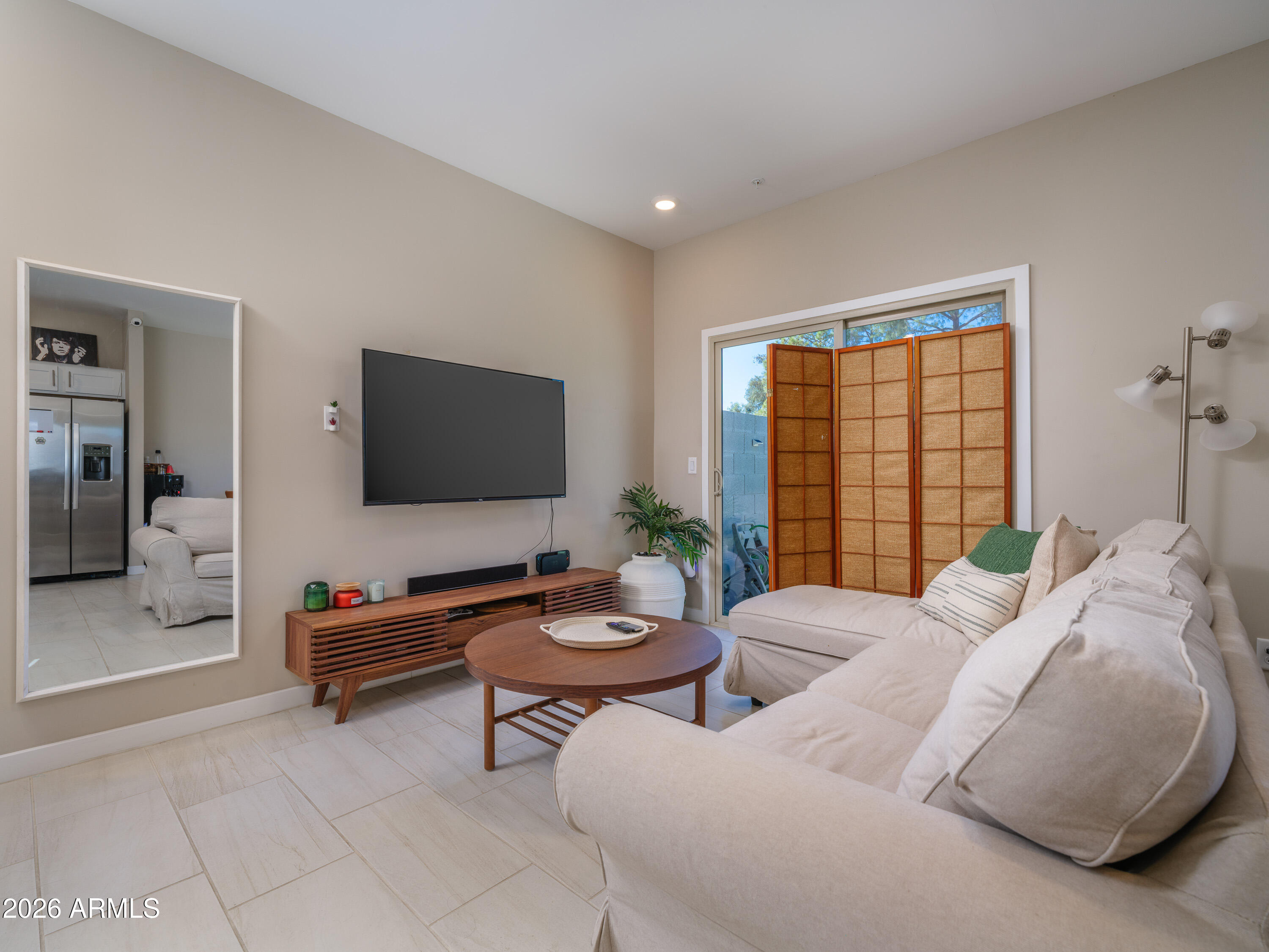 2170 West Harmont Drive Phoenix, AZ 85021 - Photo 4 of 32 a living room with furniture and a flat screen tv