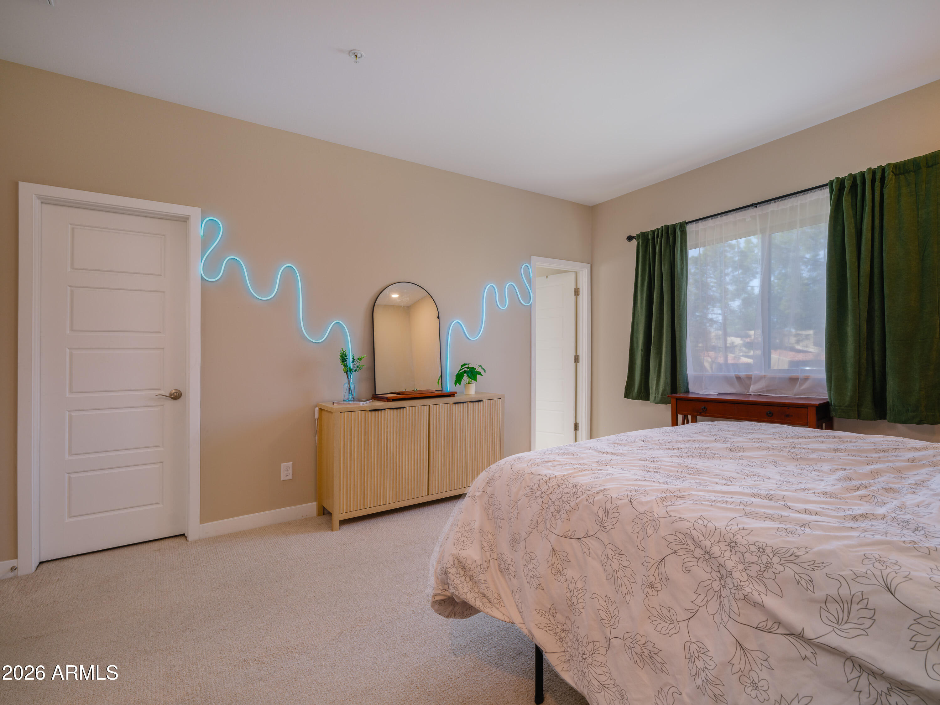2170 West Harmont Drive Phoenix, AZ 85021 - Photo 8 of 32 a bedroom with a bed and a dresser