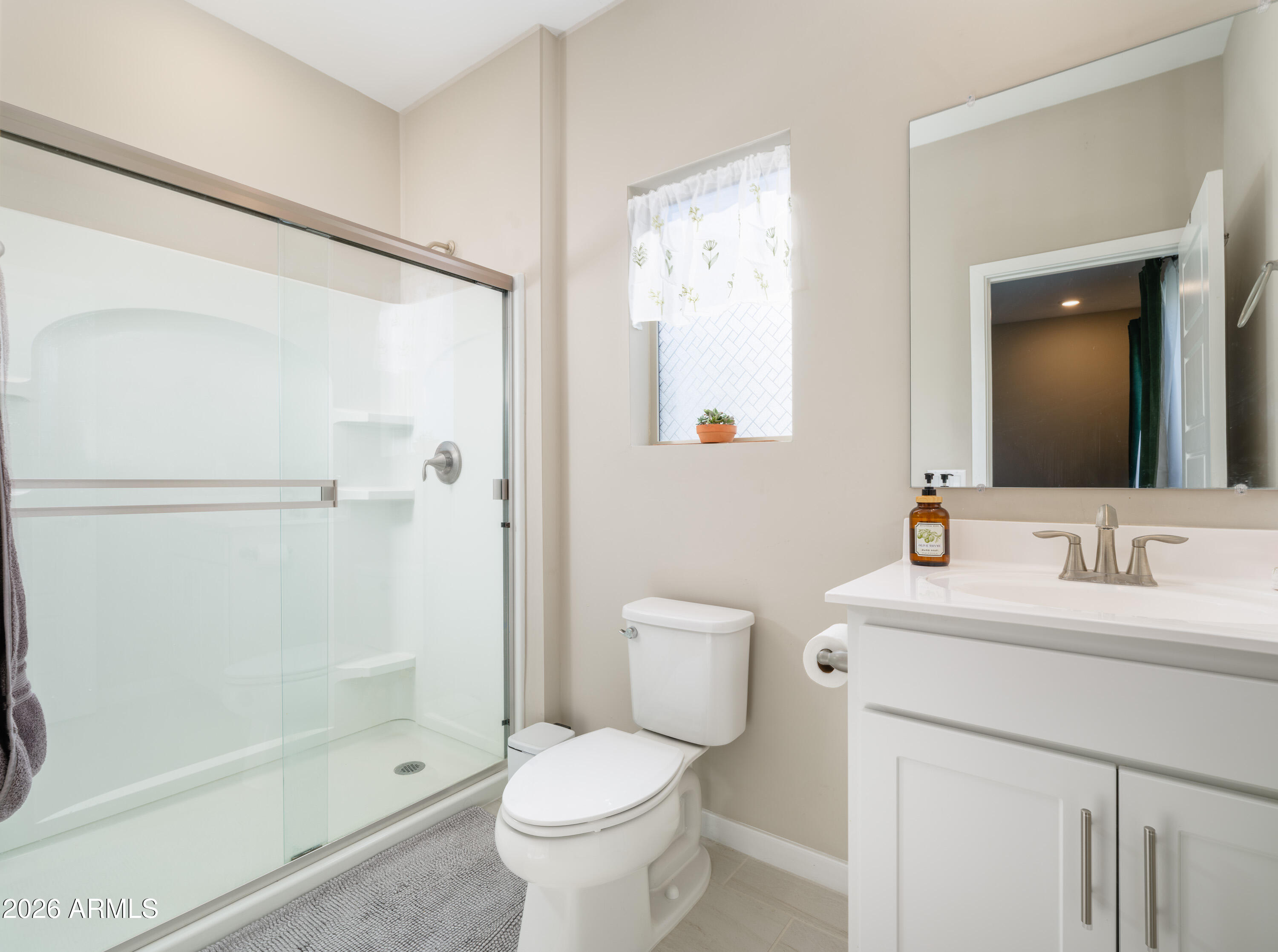2170 West Harmont Drive Phoenix, AZ 85021 - Photo 9 of 32 a bathroom with a sink toilet and shower