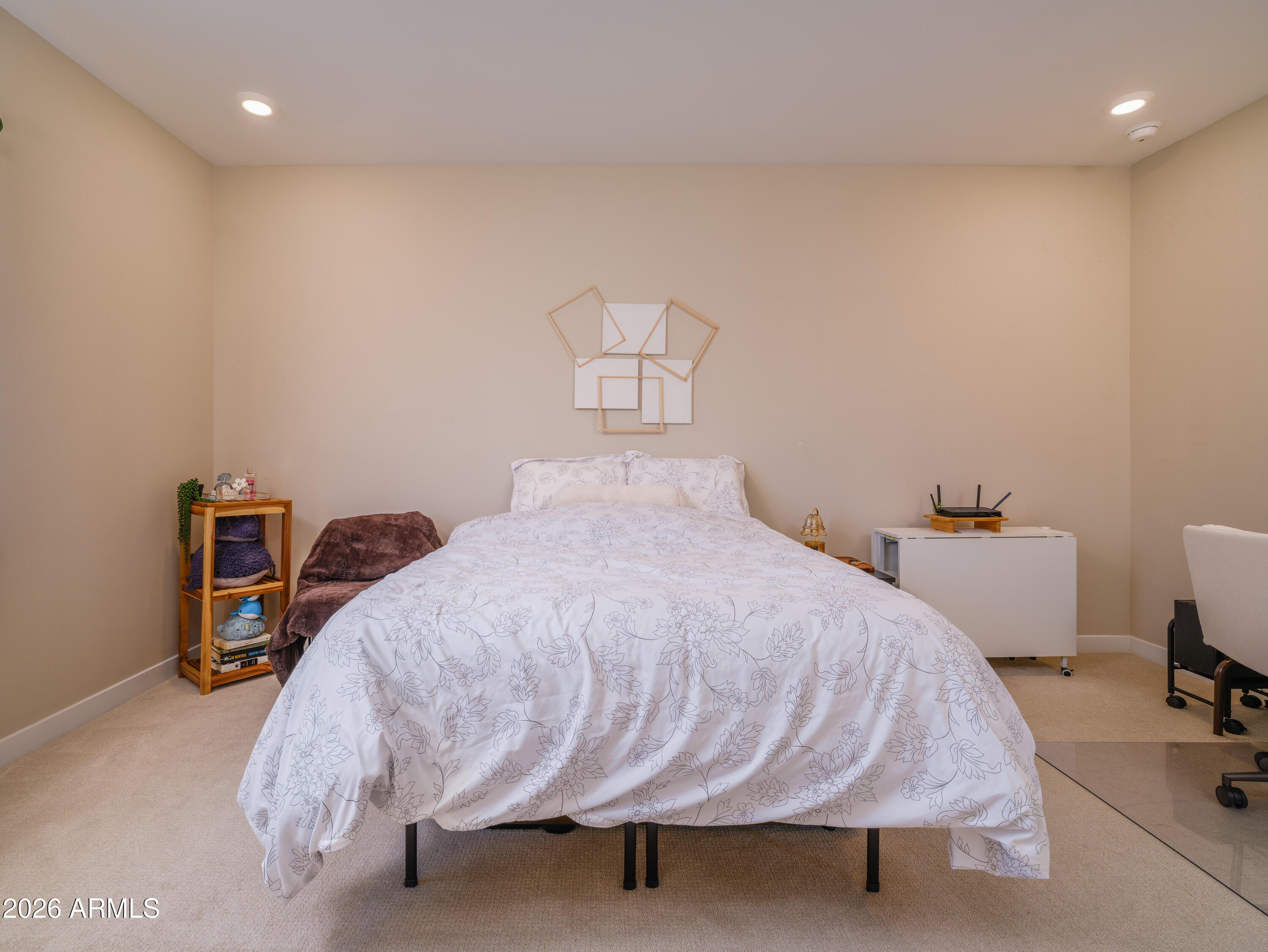2170 West Harmont Drive Phoenix, AZ 85021 - Photo 10 of 32 a bedroom with a bed and a desk