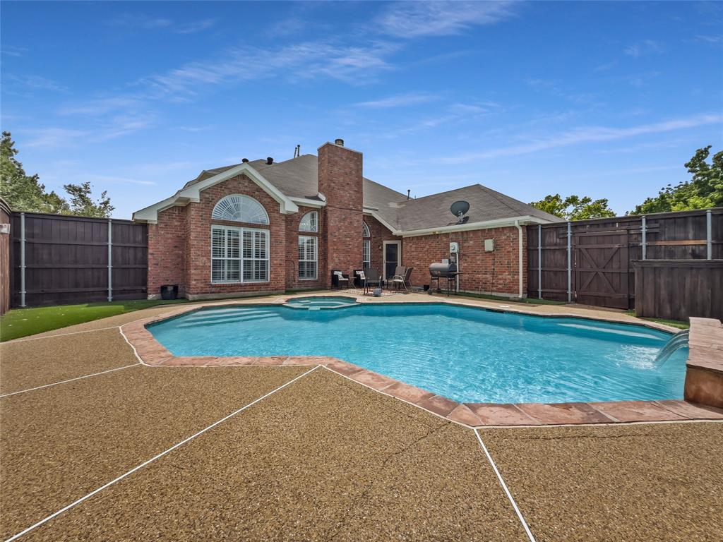 2317 Wellesly Road Rowlett, TX 75089 - Photo 34 of 39 a view of a house with a big yard and large trees