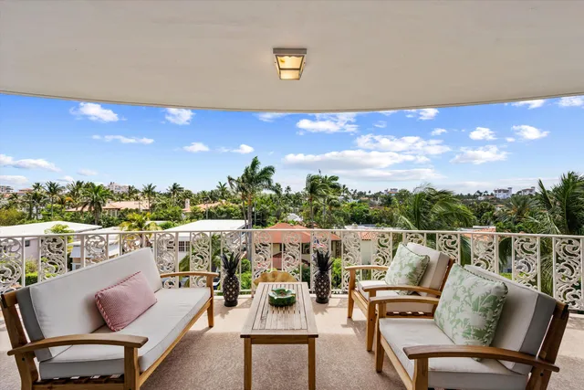 a view of a terrace with furniture