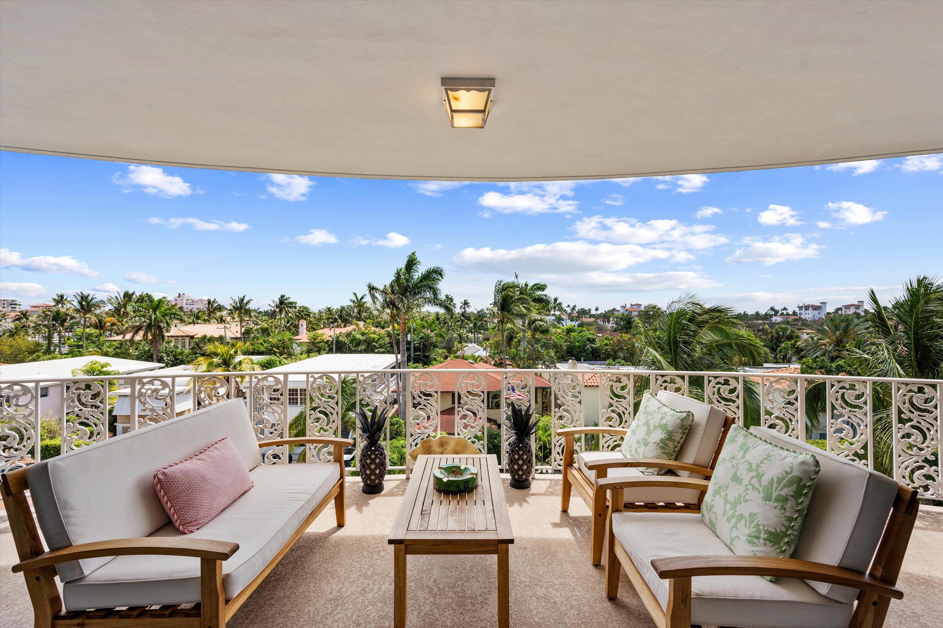 227 Australian Avenue, Unit 4C Palm Beach, FL 33480 - Photo 11 of 16 a view of a terrace with furniture