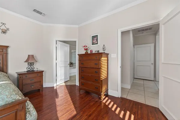 a room with furniture and wooden floor