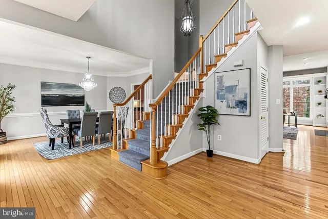 a bedroom with a bed and table