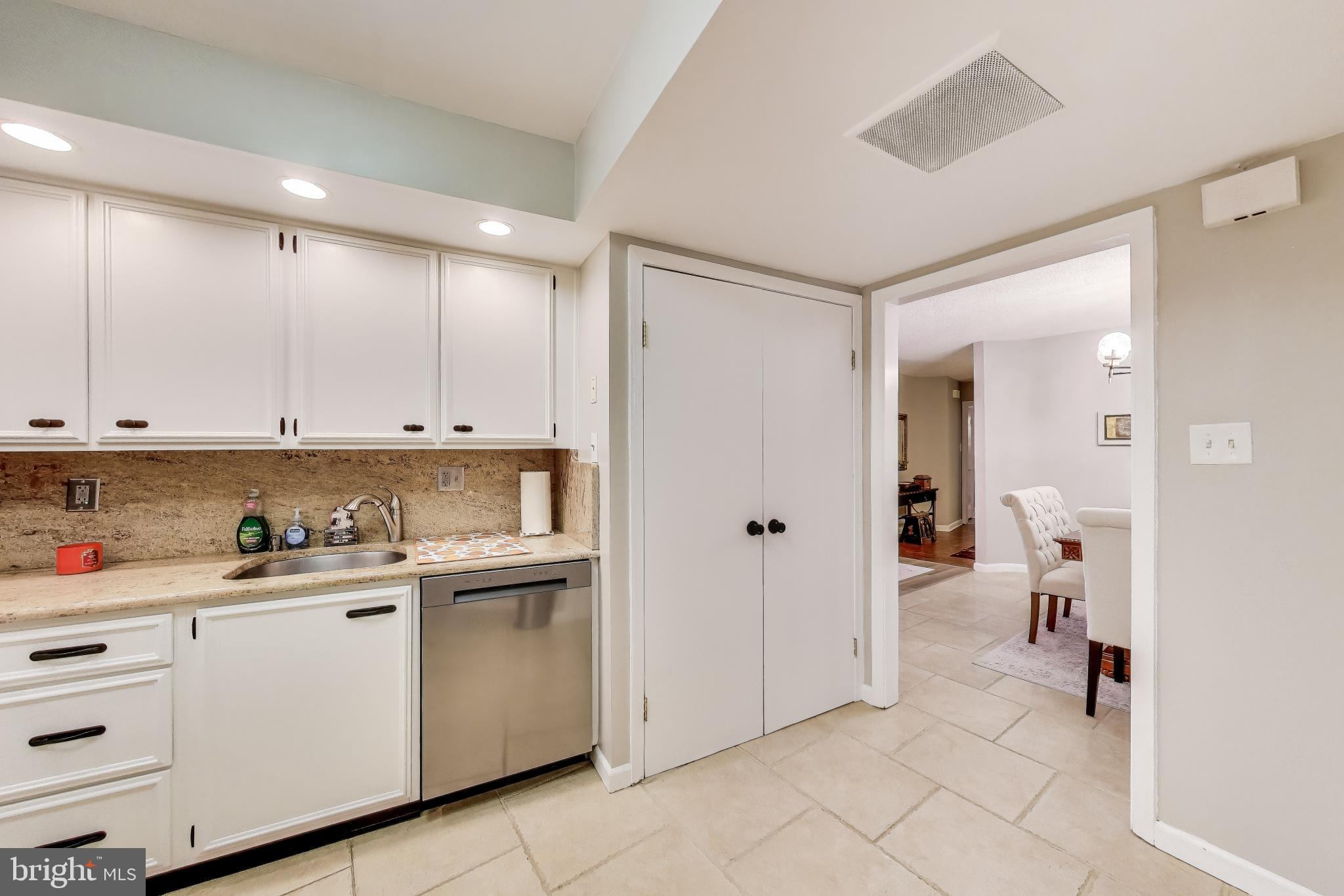 1101 South Arlington Ridge Road, Unit 305 Arlington, VA 22202 - Photo 14 of 51 Kitchen features Pantry and Laundry