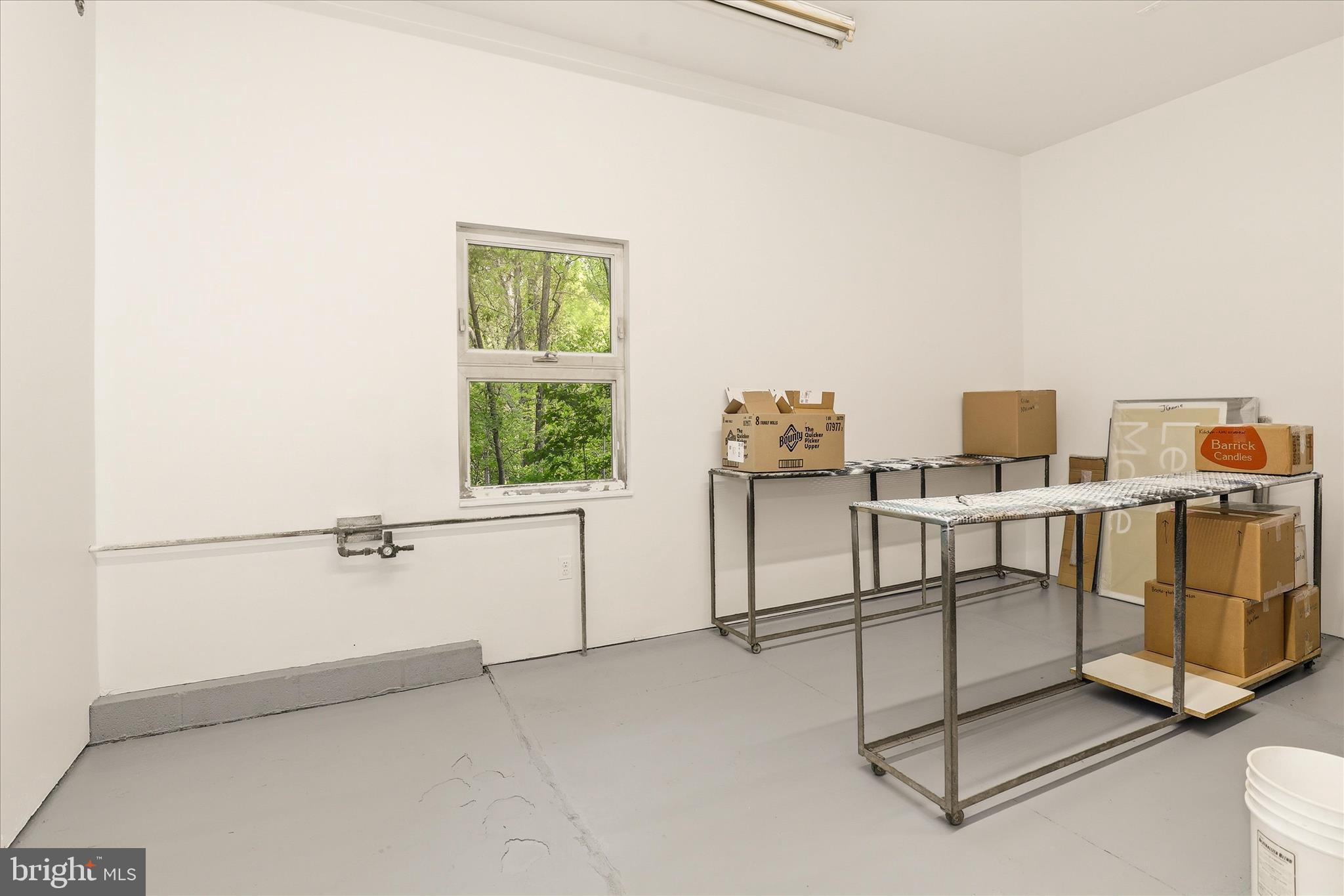 927 Buckhorn Road Sykesville, MD 21784 - Photo 79 of 147 a view of a room with racks on the wall