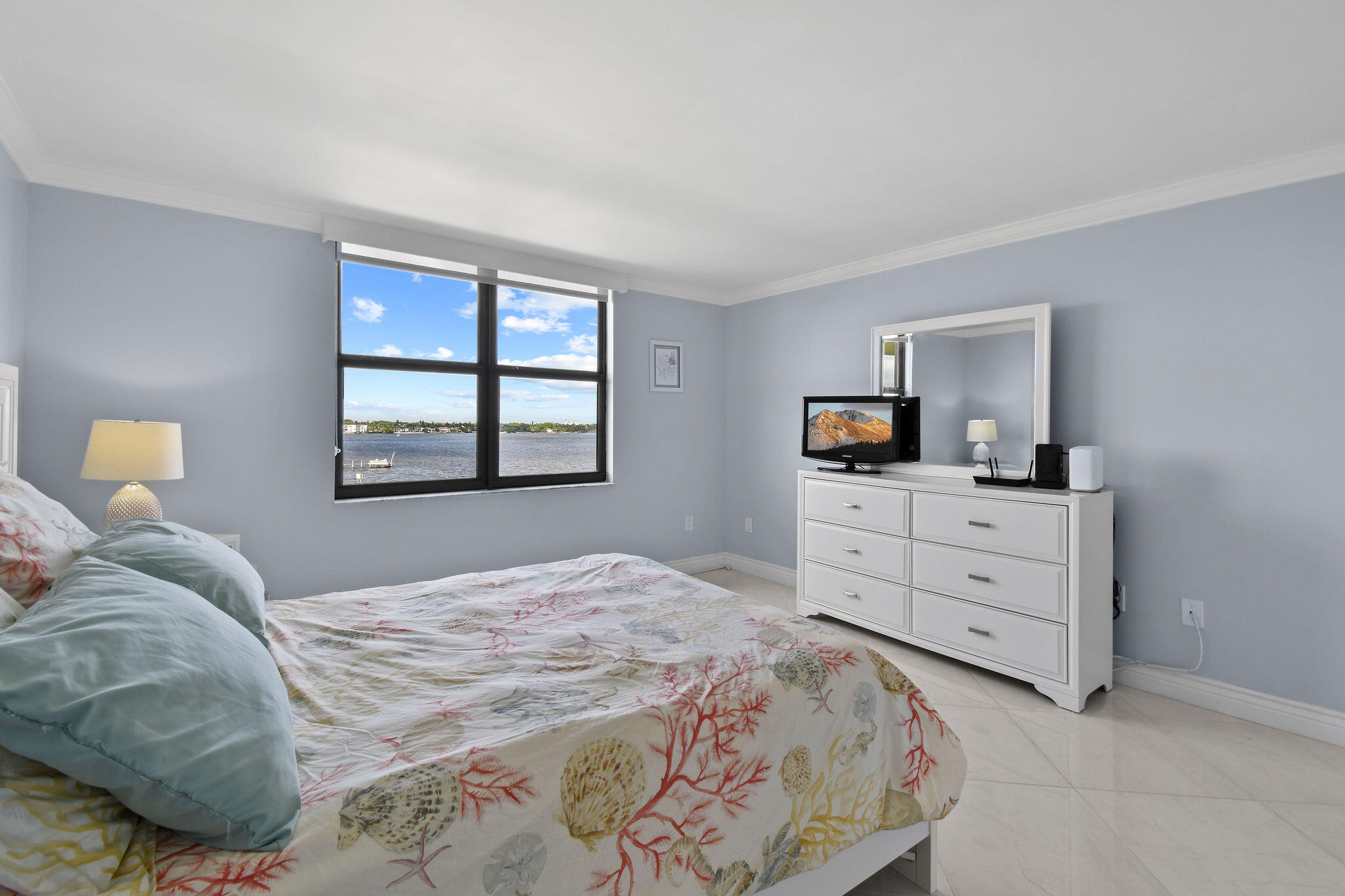 3460 South Ocean Boulevard, Unit 5100 Palm Beach, FL 33480 - Photo 15 of 42 a bedroom with a bed and a dresser