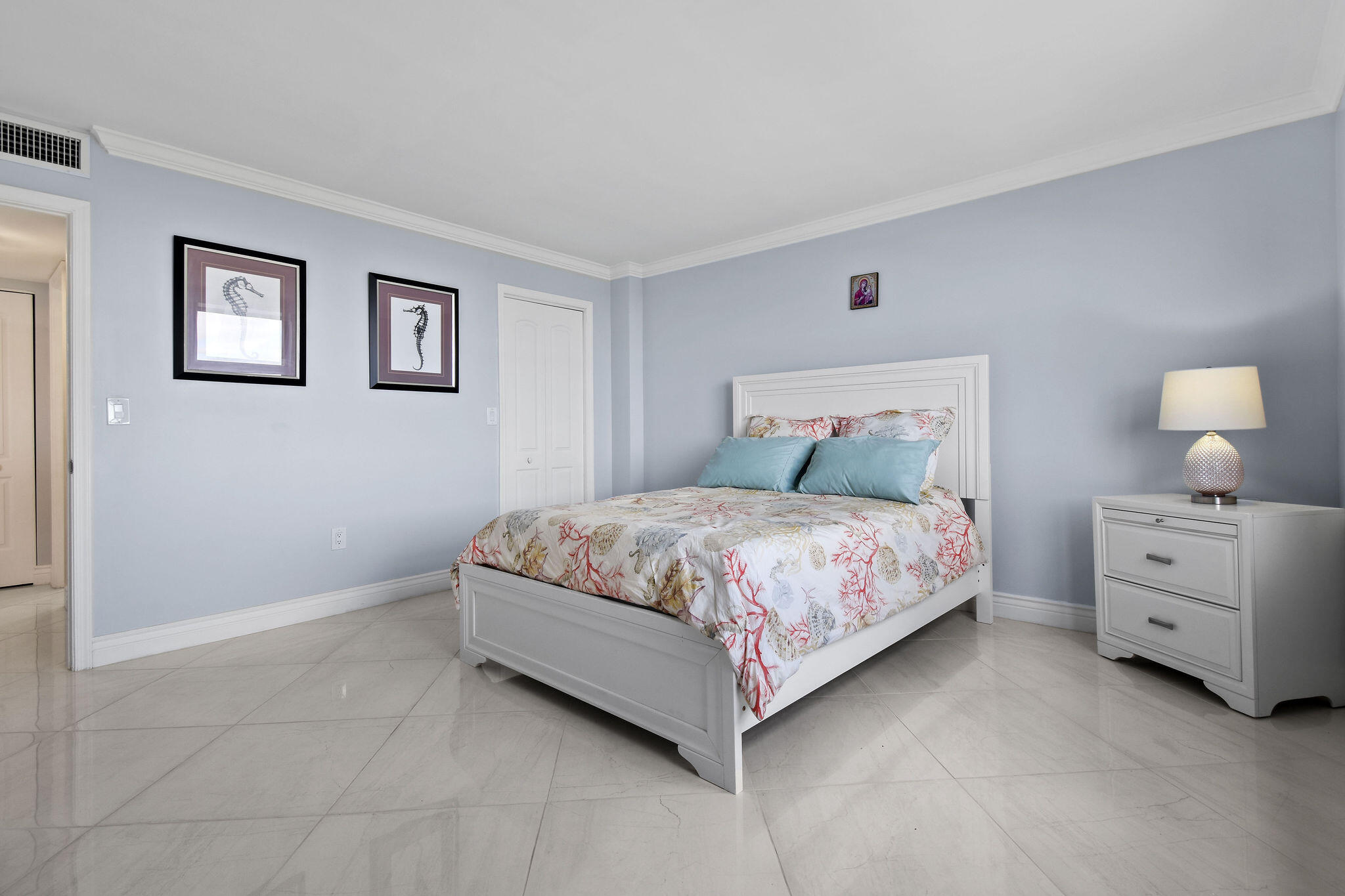 3460 South Ocean Boulevard, Unit 5100 Palm Beach, FL 33480 - Photo 16 of 42 a bedroom with a bed and a dresser