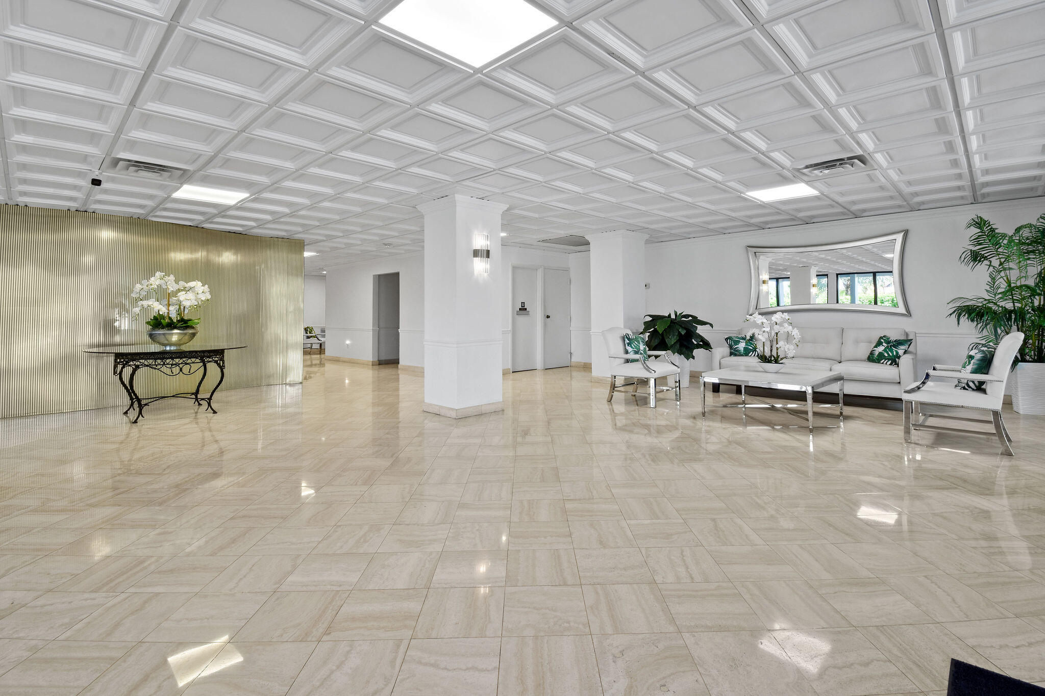 3460 South Ocean Boulevard, Unit 5100 Palm Beach, FL 33480 - Photo 23 of 42 a view of a lobby with furniture and a chandelier