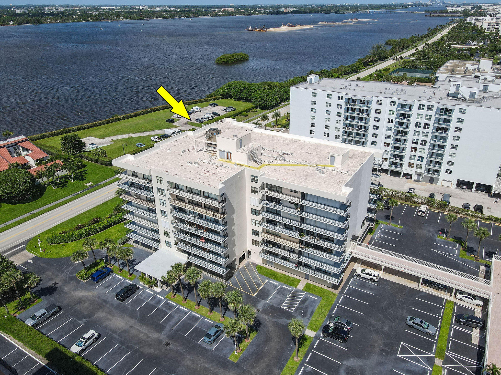 3460 South Ocean Boulevard, Unit 5100 Palm Beach, FL 33480 - Photo 35 of 42 a view of a backyard with plants and outdoor seating