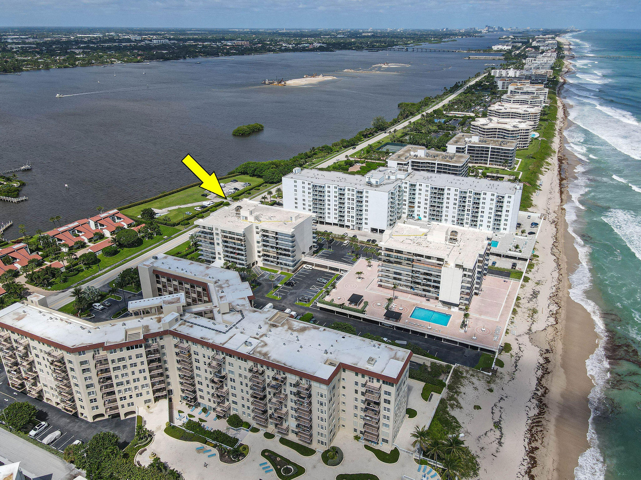 3460 South Ocean Boulevard, Unit 5100 Palm Beach, FL 33480 - Photo 40 of 42 a house with river in front of it