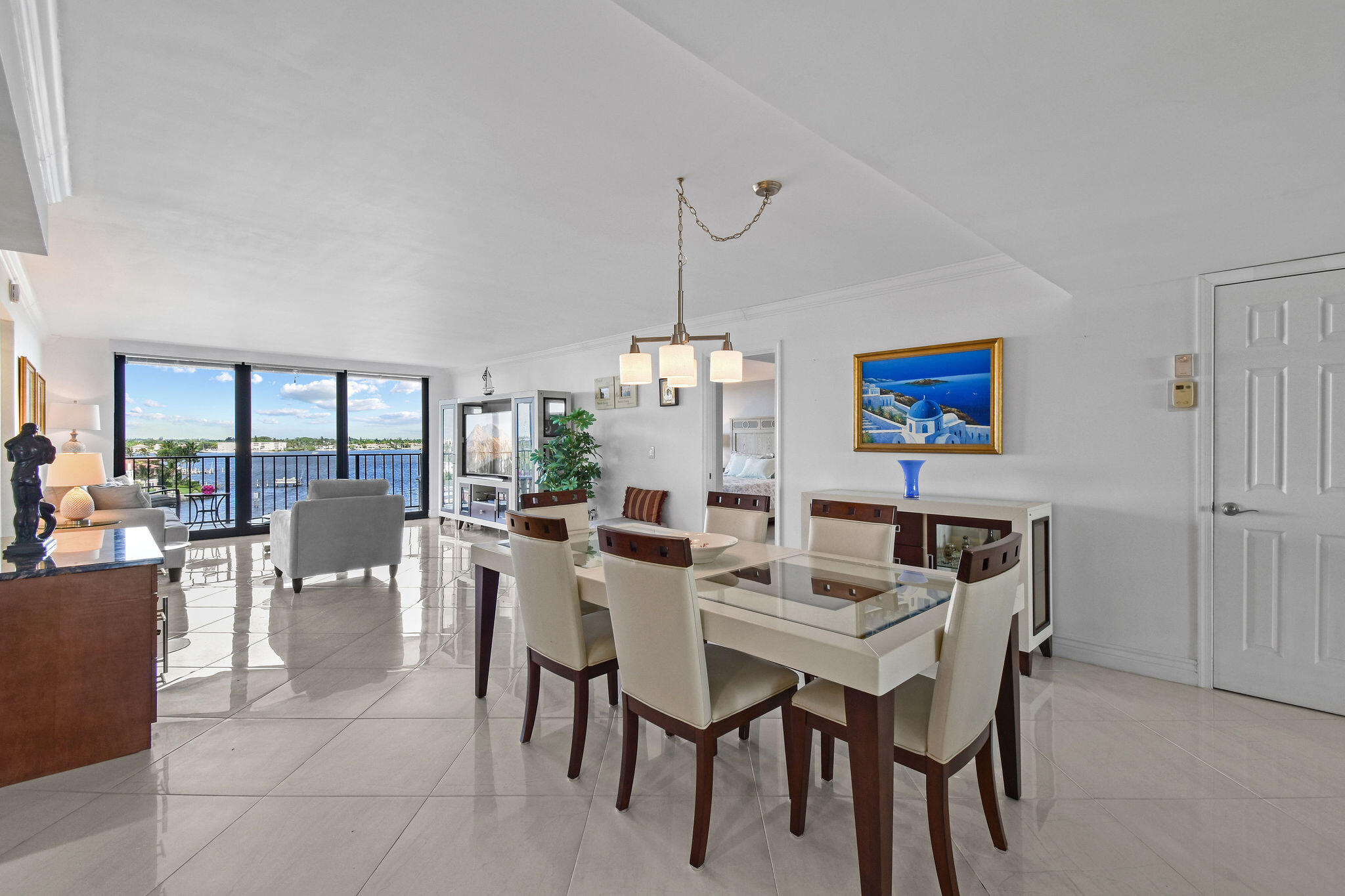 3460 South Ocean Boulevard, Unit 5100 Palm Beach, FL 33480 - Photo 4 of 42 a view of a dining room with furniture