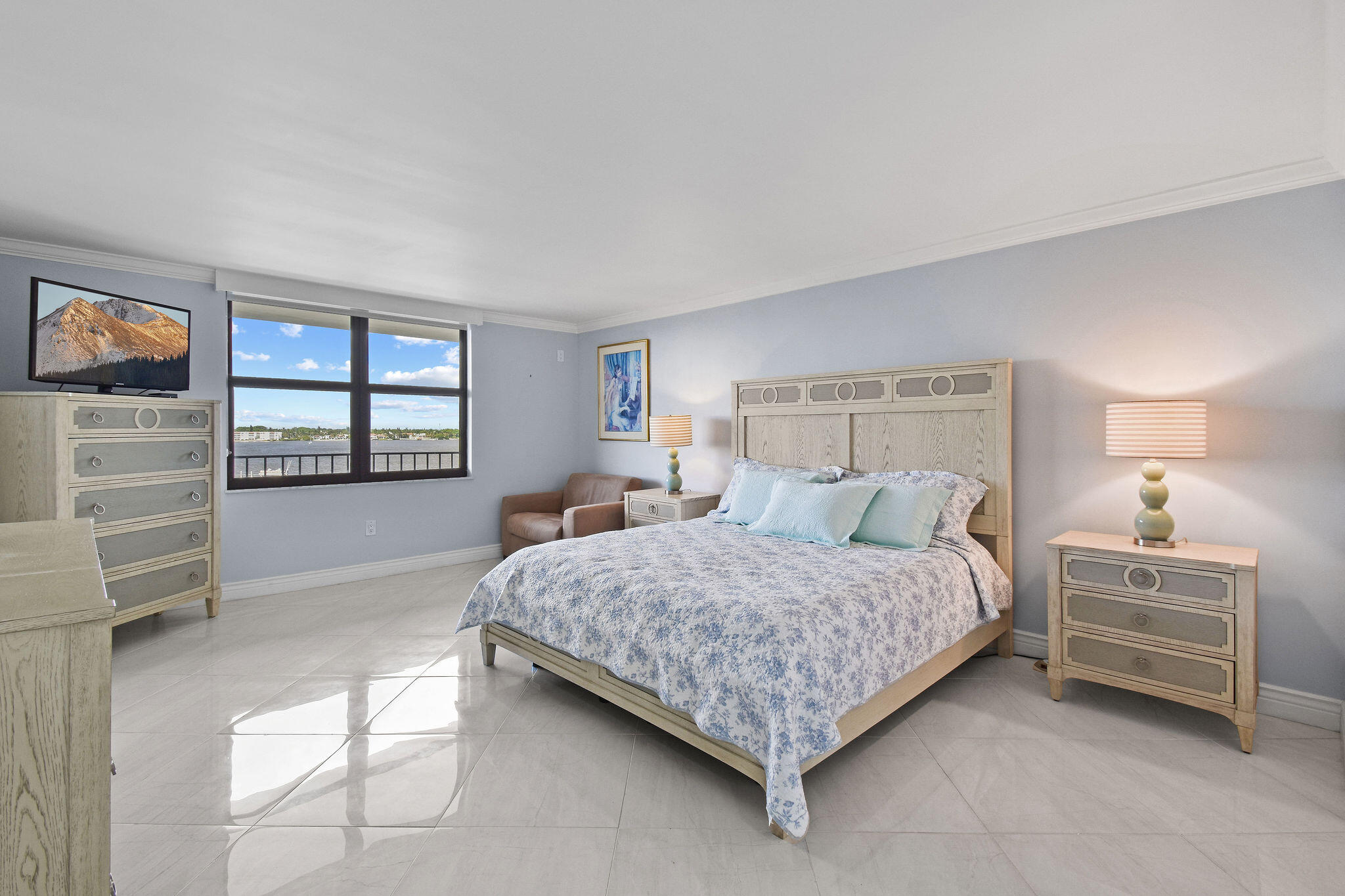 3460 South Ocean Boulevard, Unit 5100 Palm Beach, FL 33480 - Photo 8 of 42 a bedroom with a bed and a window