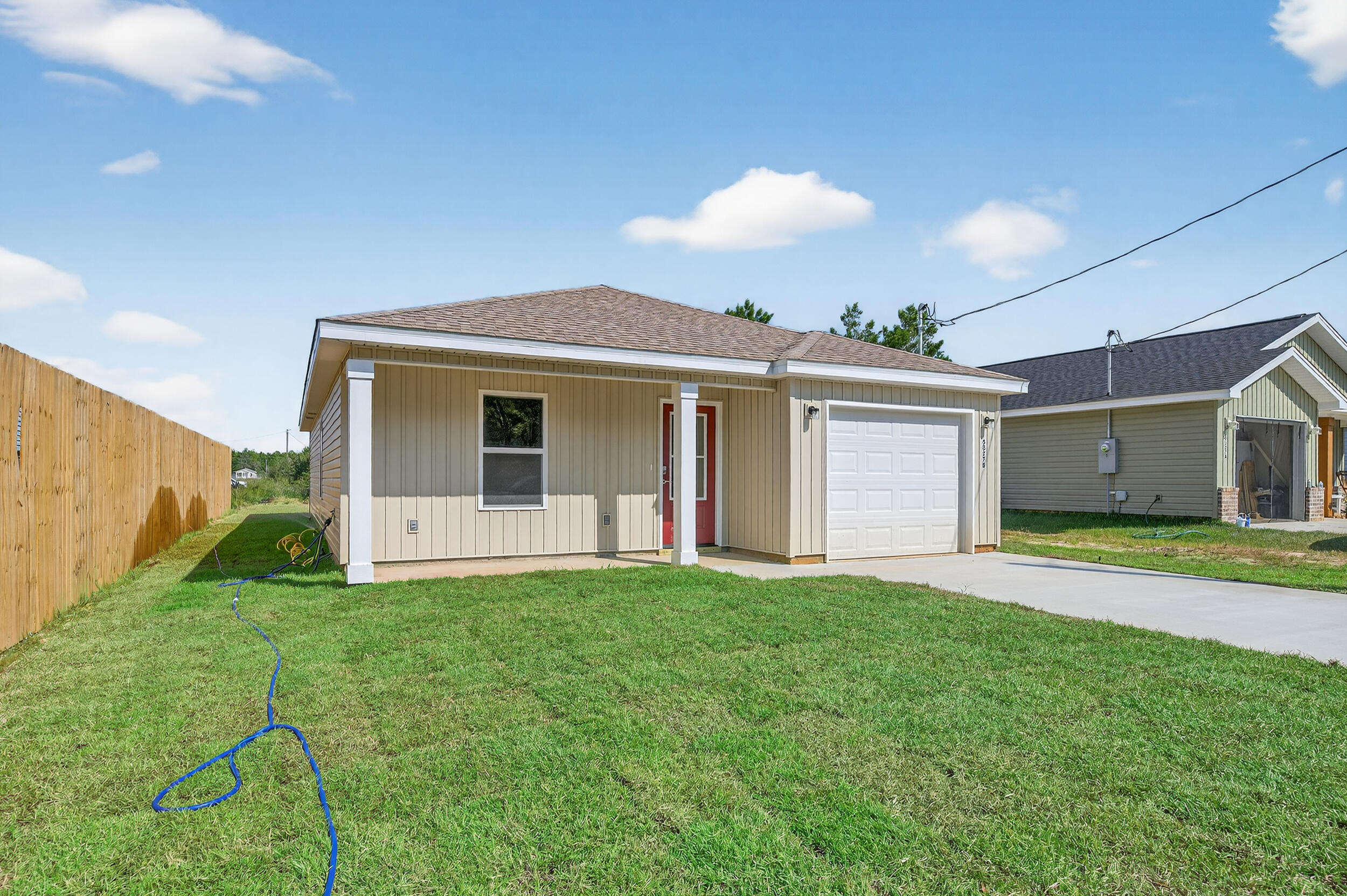 5327 B Kervin Road Crestview, FL 32539 - Photo 2 of 47 a front view of a house with a yard and garage