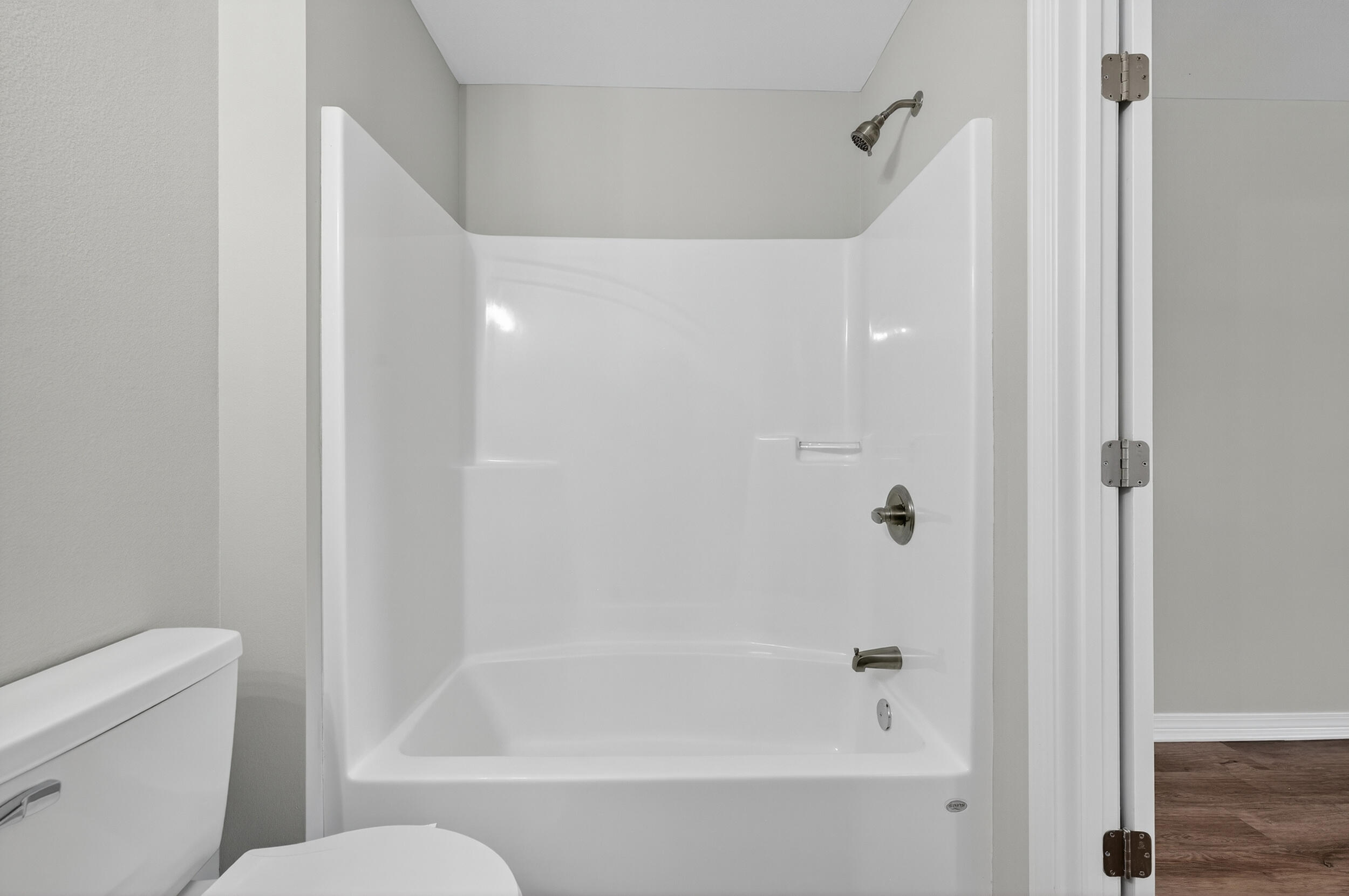 5327 B Kervin Road Crestview, FL 32539 - Photo 29 of 47 a bathroom with a bathtub and a toilet