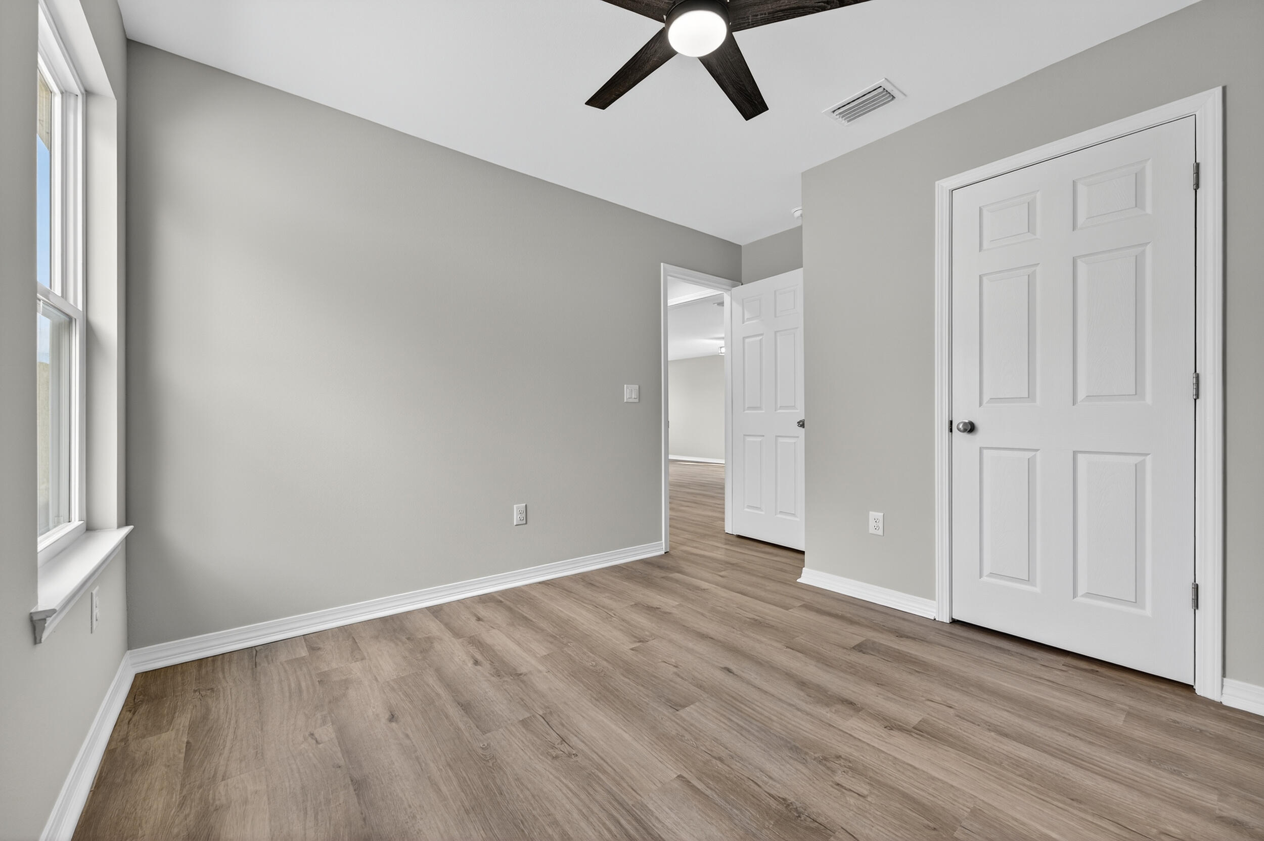 5327 B Kervin Road Crestview, FL 32539 - Photo 36 of 47 wooden floor in an empty room