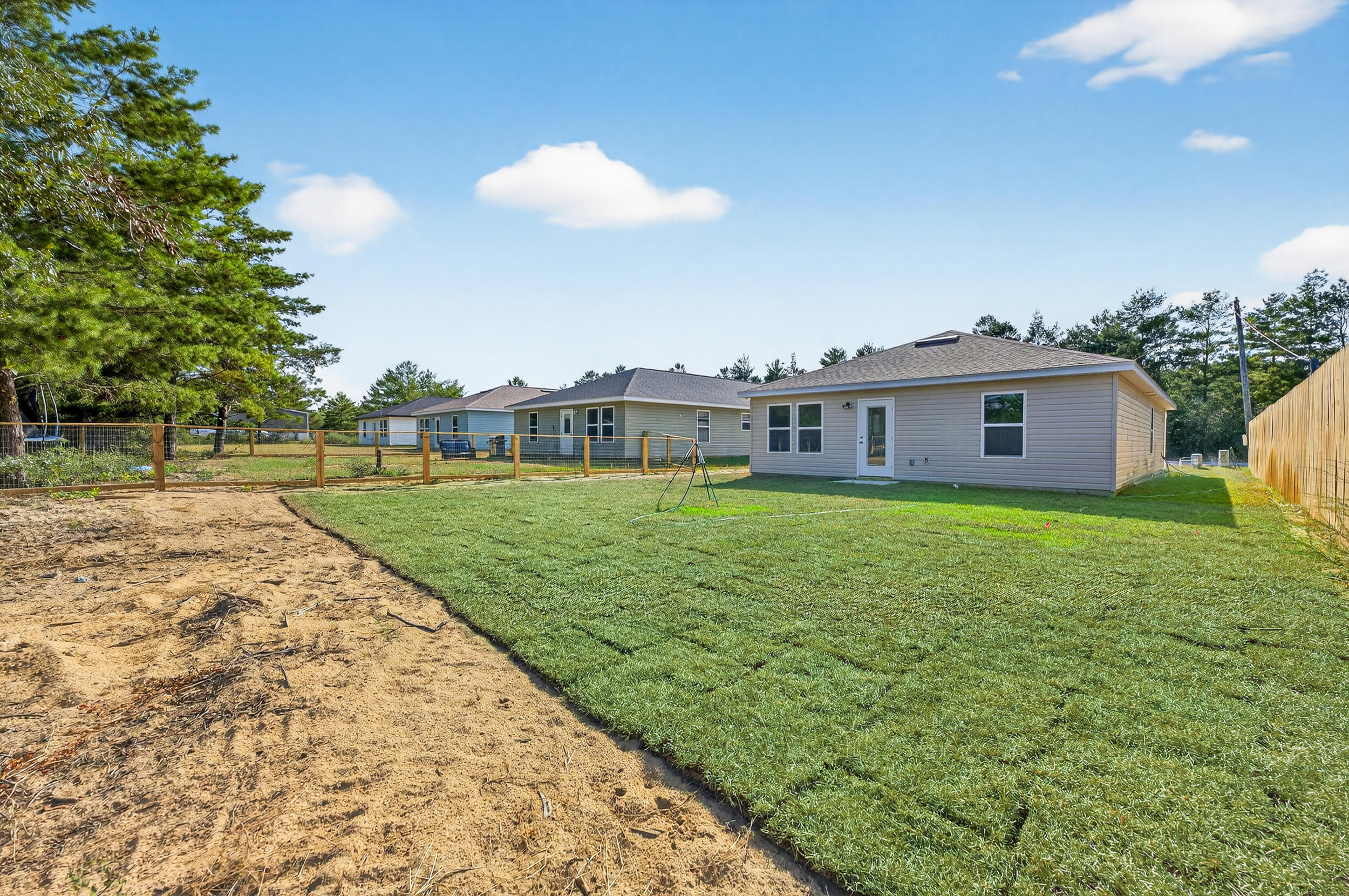 5327 B Kervin Road Crestview, FL 32539 - Photo 45 of 47 a front view of a house with garden