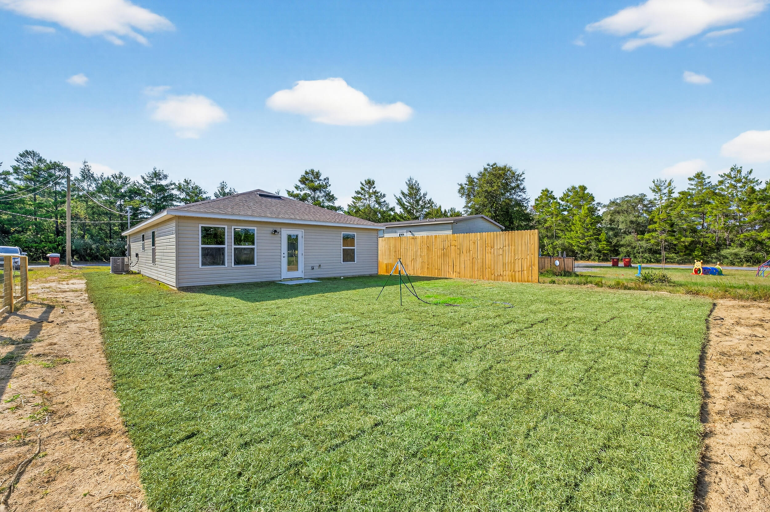 5327 B Kervin Road Crestview, FL 32539 - Photo 47 of 47 a front view of house with yard and trees in the background