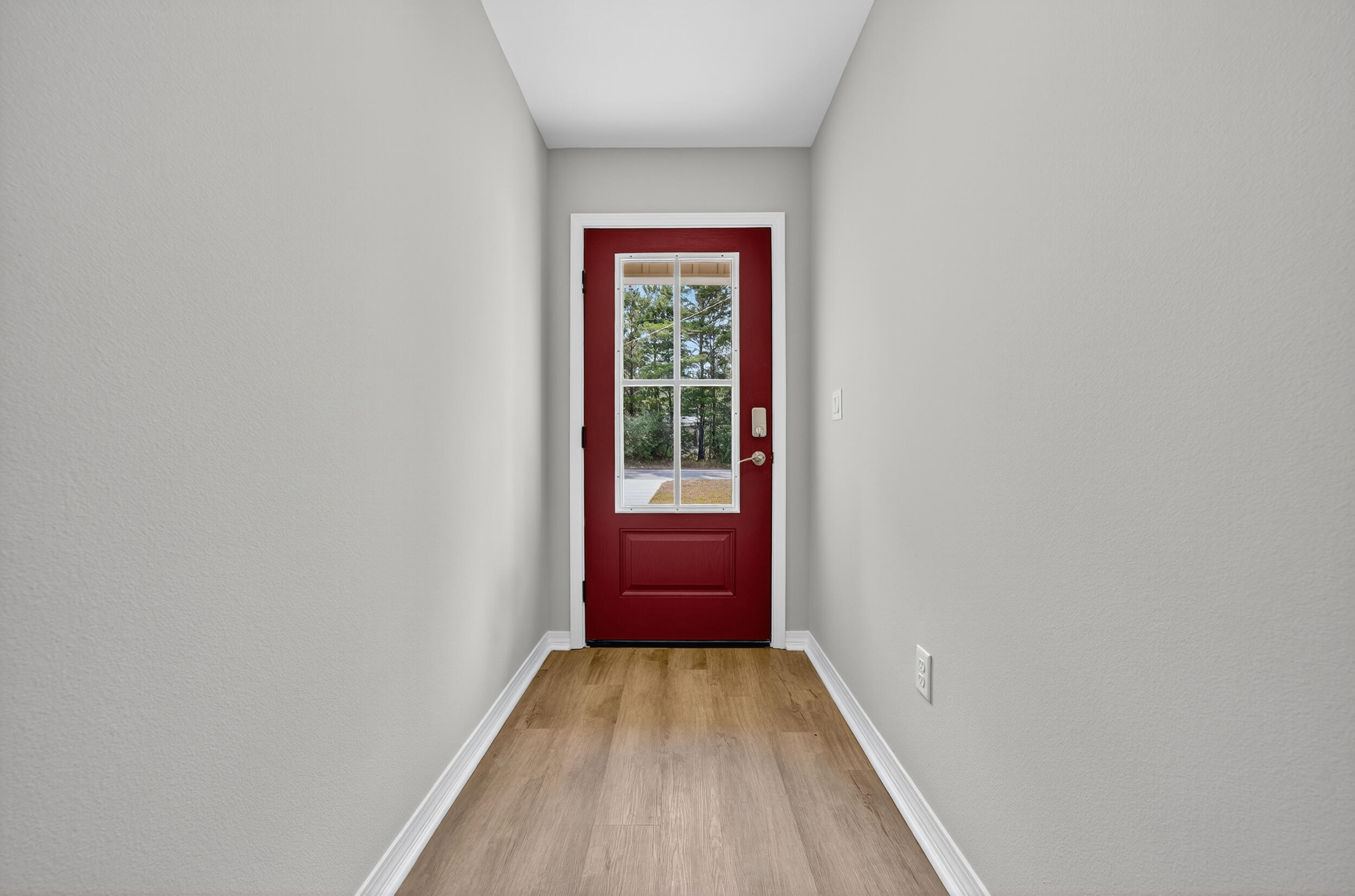 5327 B Kervin Road Crestview, FL 32539 - Photo 6 of 47 a view of a room with wooden floor