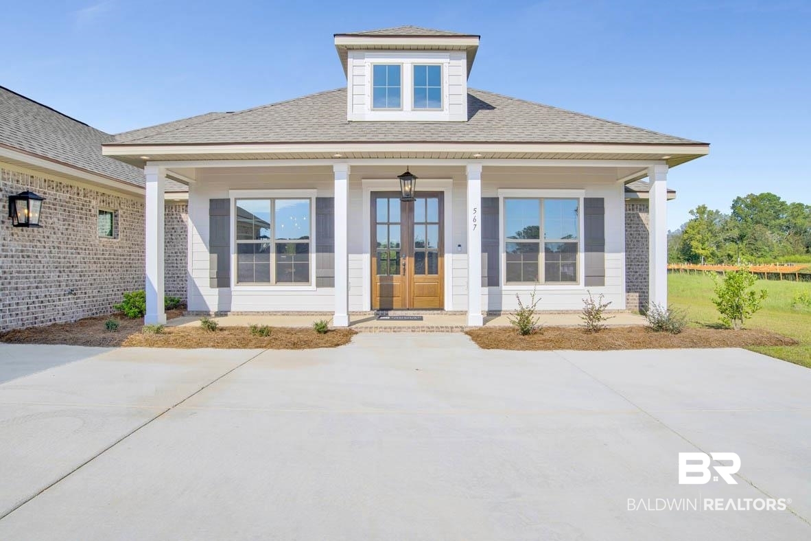 393 Garrison Boulevard Fairhope, AL 36532 - Photo 2 of 40 View of front of house featuring a porch