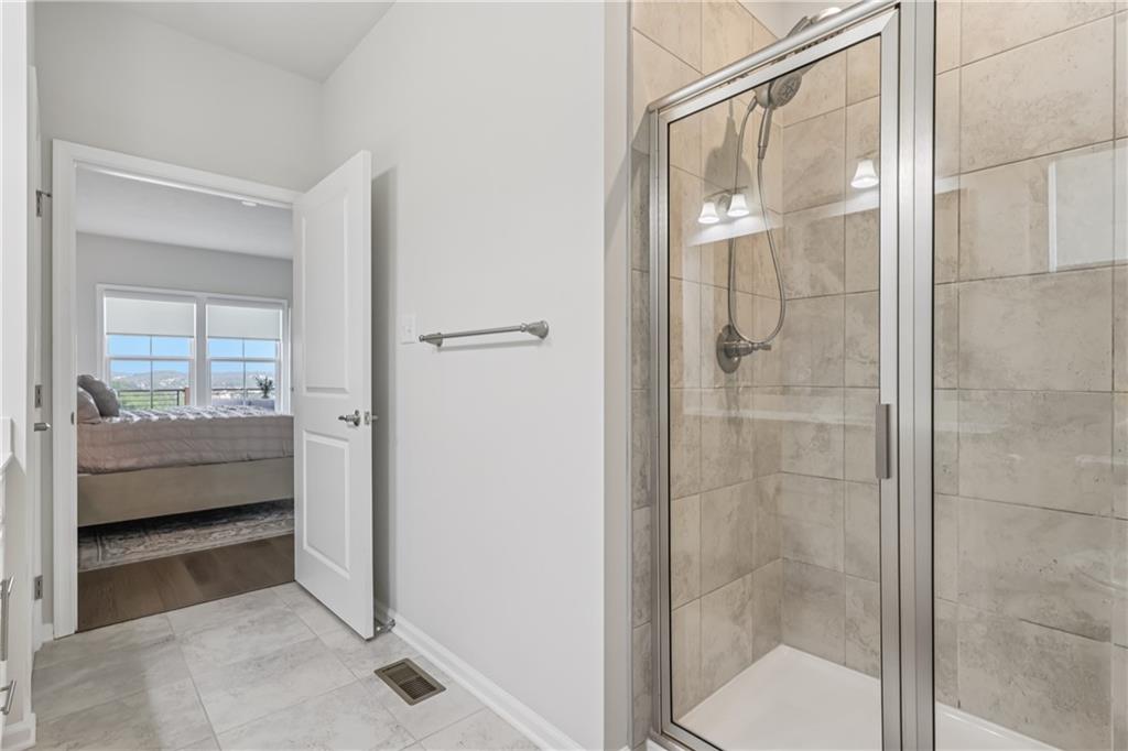 332 Red Bud Lane Washington, PA 15301 - Photo 17 of 47 a bathroom with a glass shower door