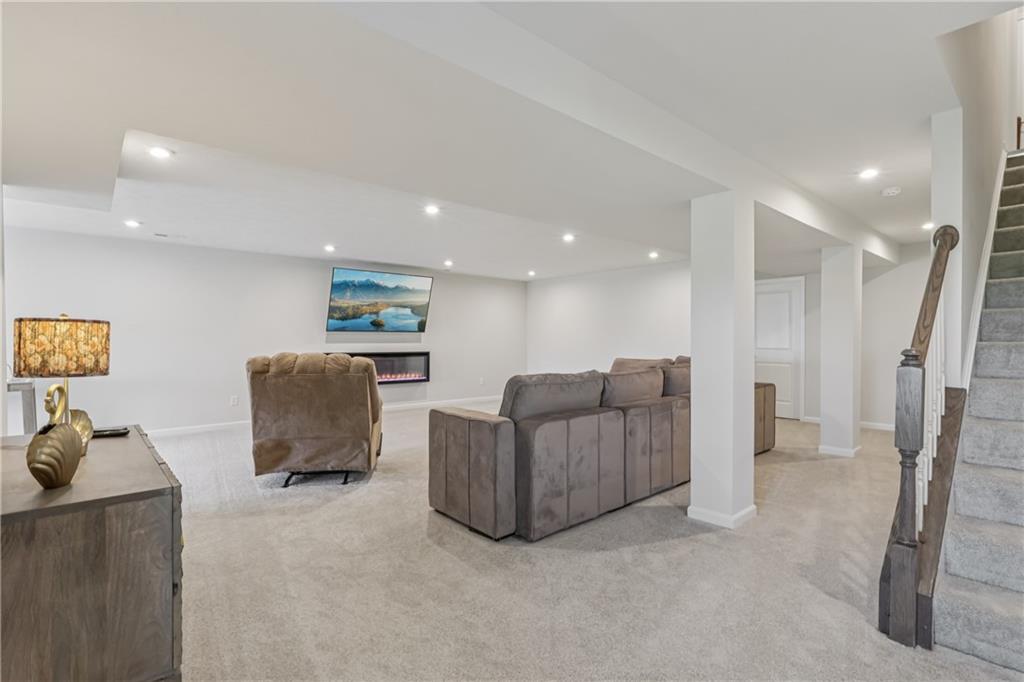 332 Red Bud Lane Washington, PA 15301 - Photo 26 of 47 a living room with furniture and a flat screen tv