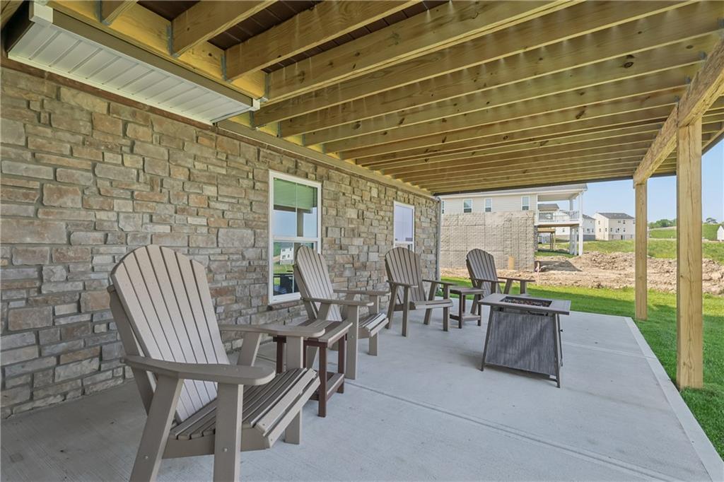 332 Red Bud Lane Washington, PA 15301 - Photo 32 of 47 a patio with table and chairs