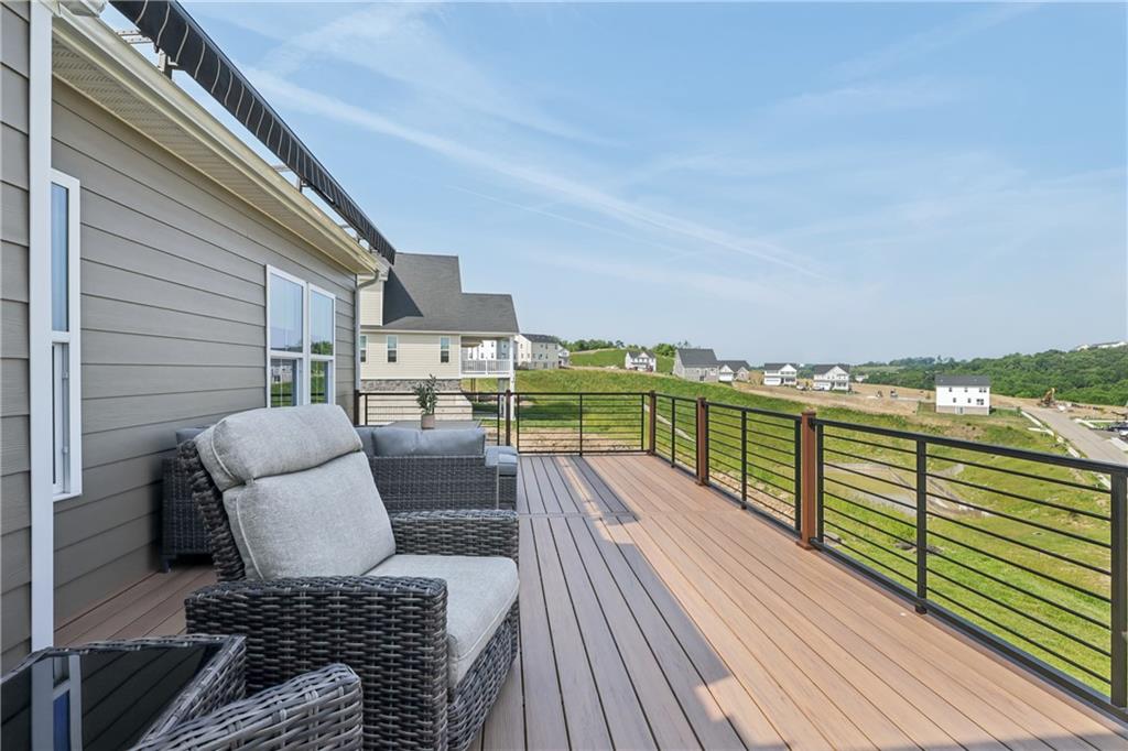 332 Red Bud Lane Washington, PA 15301 - Photo 34 of 47 a balcony with furniture and a wooden floor
